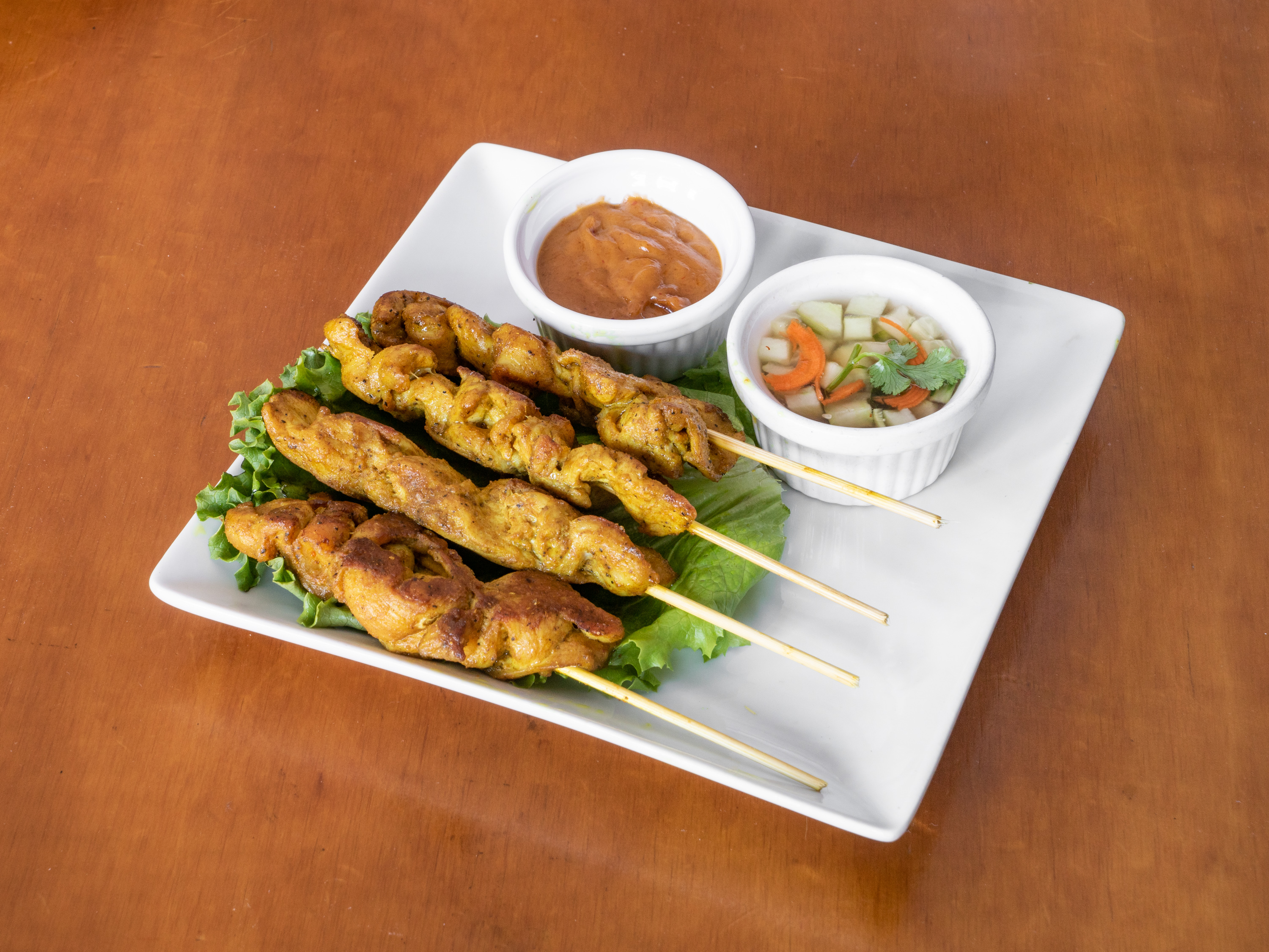 Order Chicken Satay food online from Mango Thai Restaurant store, Saint Paul on bringmethat.com