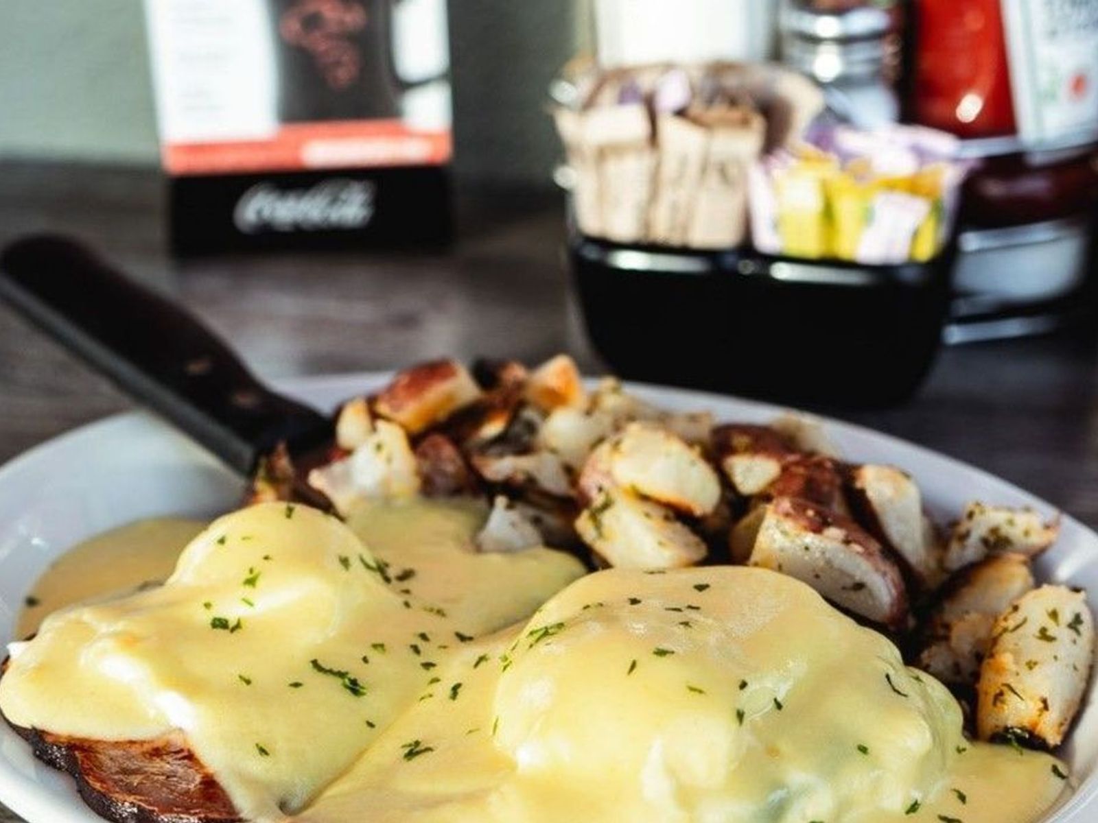 Order Ham Benedict - OO food online from Biscuits Cafe store, Chandler on bringmethat.com