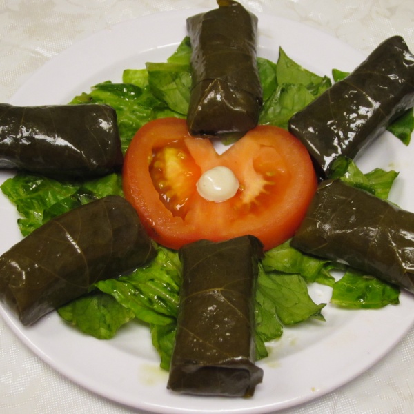 Order Stuffed Grape Leaves 6 pieces food online from Shako Mako Grill store, Glendale on bringmethat.com