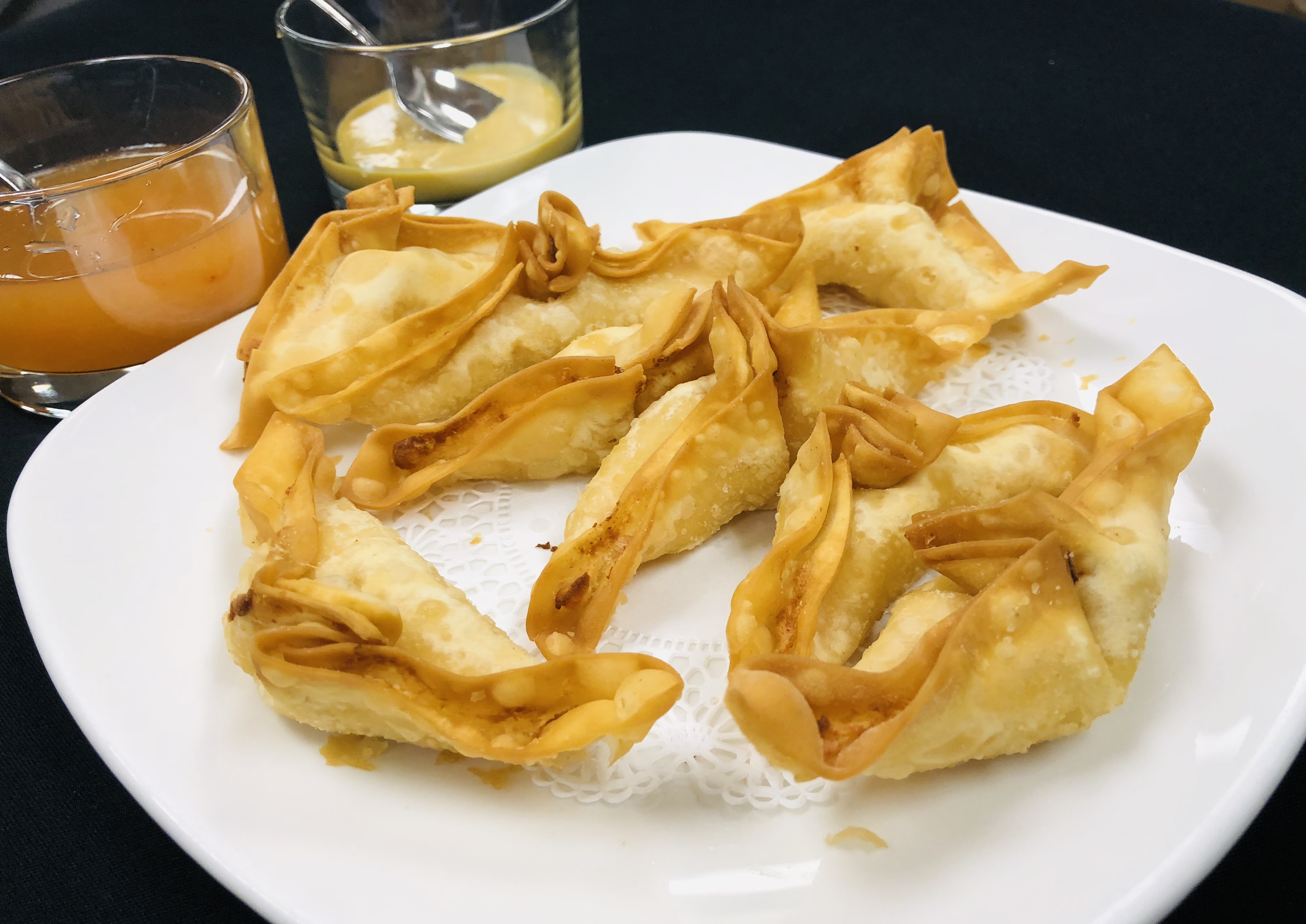 Order 8 Pieces Crab Rangoon food online from Feng Shui Kitchen store, Waltham on bringmethat.com