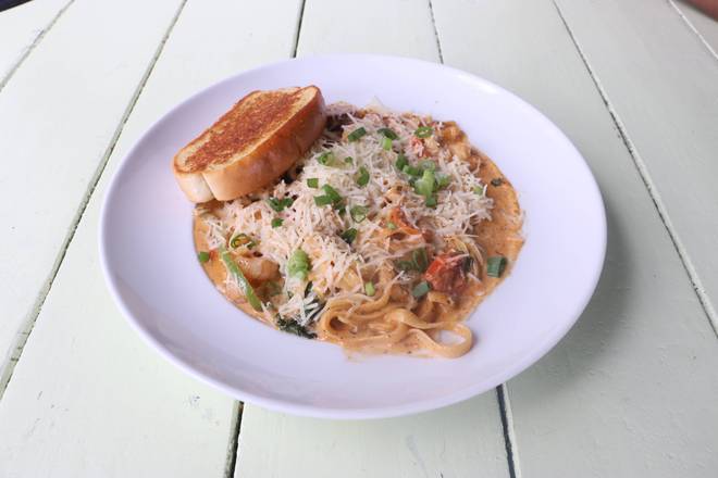 Order Cajun Pasta food online from Lost & Found store, Houston on bringmethat.com