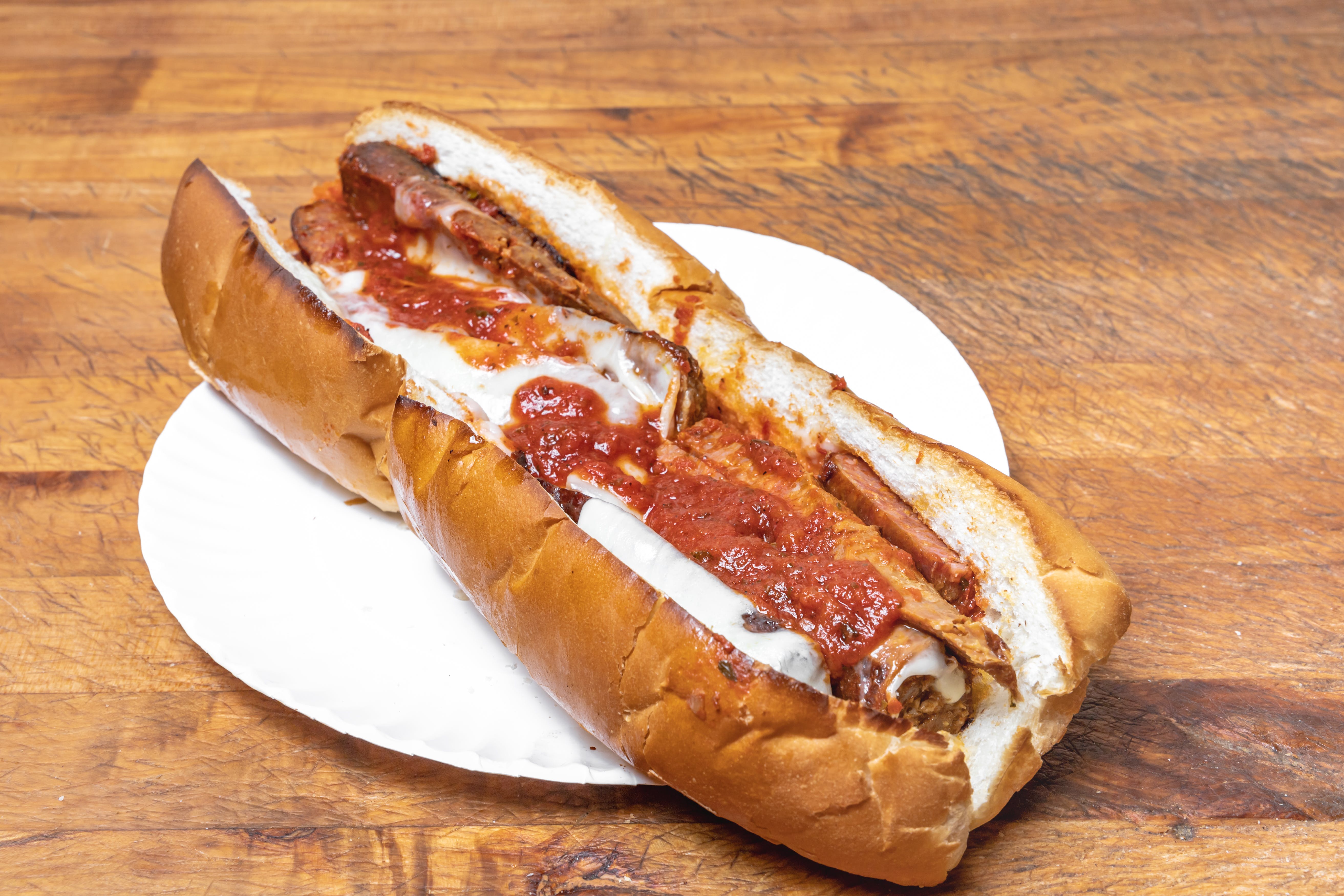 Order Sausage Parmigiana Sub - Small 8" food online from Garden Pizza store, Milford on bringmethat.com