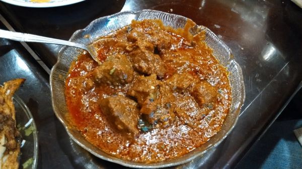 Order Achar Lamb food online from Naan N Curry store, Concord on bringmethat.com