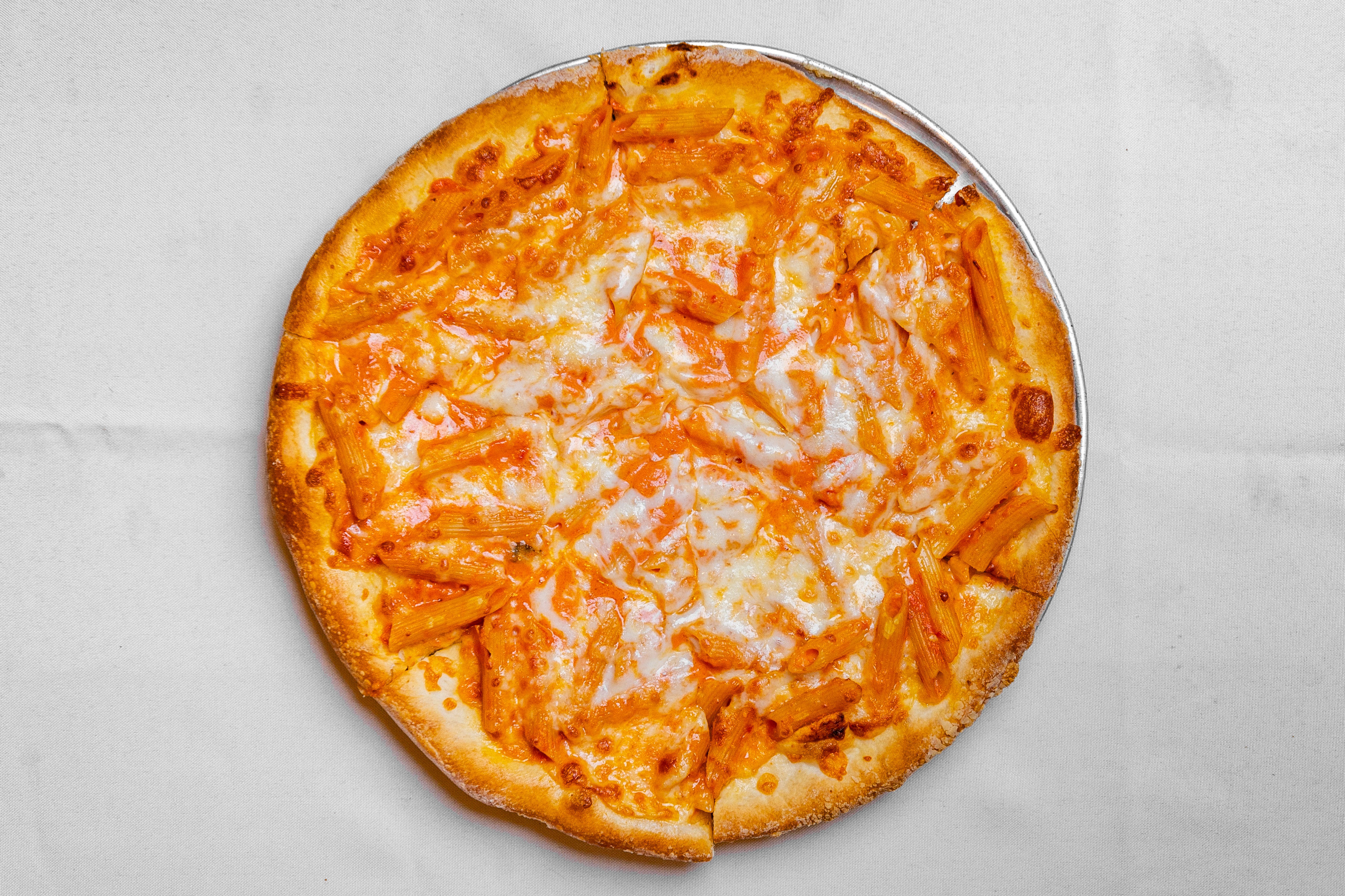 Order Penne Vodka Pizza - Small 12" food online from Angelina Trattoria store, Florham Park on bringmethat.com