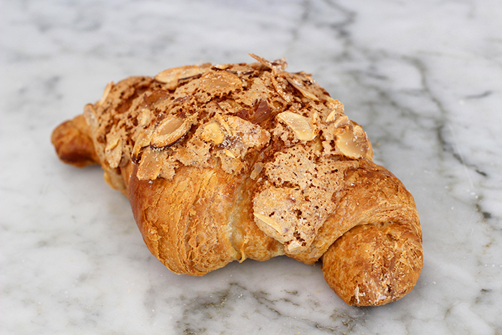 Order Almond Croissant food online from Grey Cafe store, Flushing on bringmethat.com