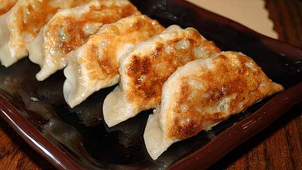 Order Dumplings (6 pcs) food online from Extreme Teriyaki Grill Express store, Tucker on bringmethat.com