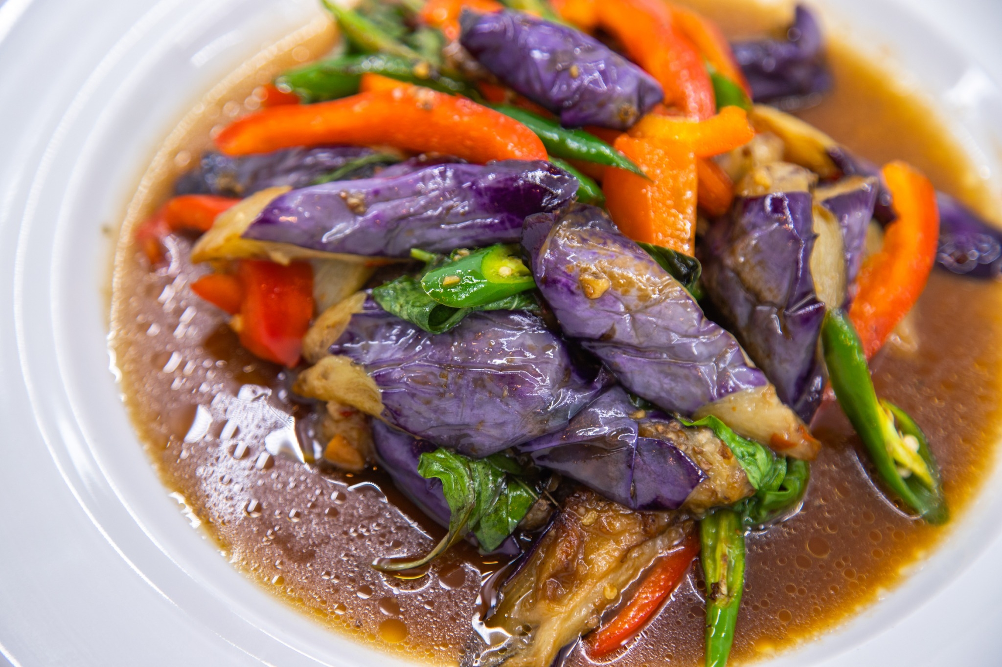 Order Eggplant with Yellow Sauce food online from Chao phra ya thai store, Herndon on bringmethat.com