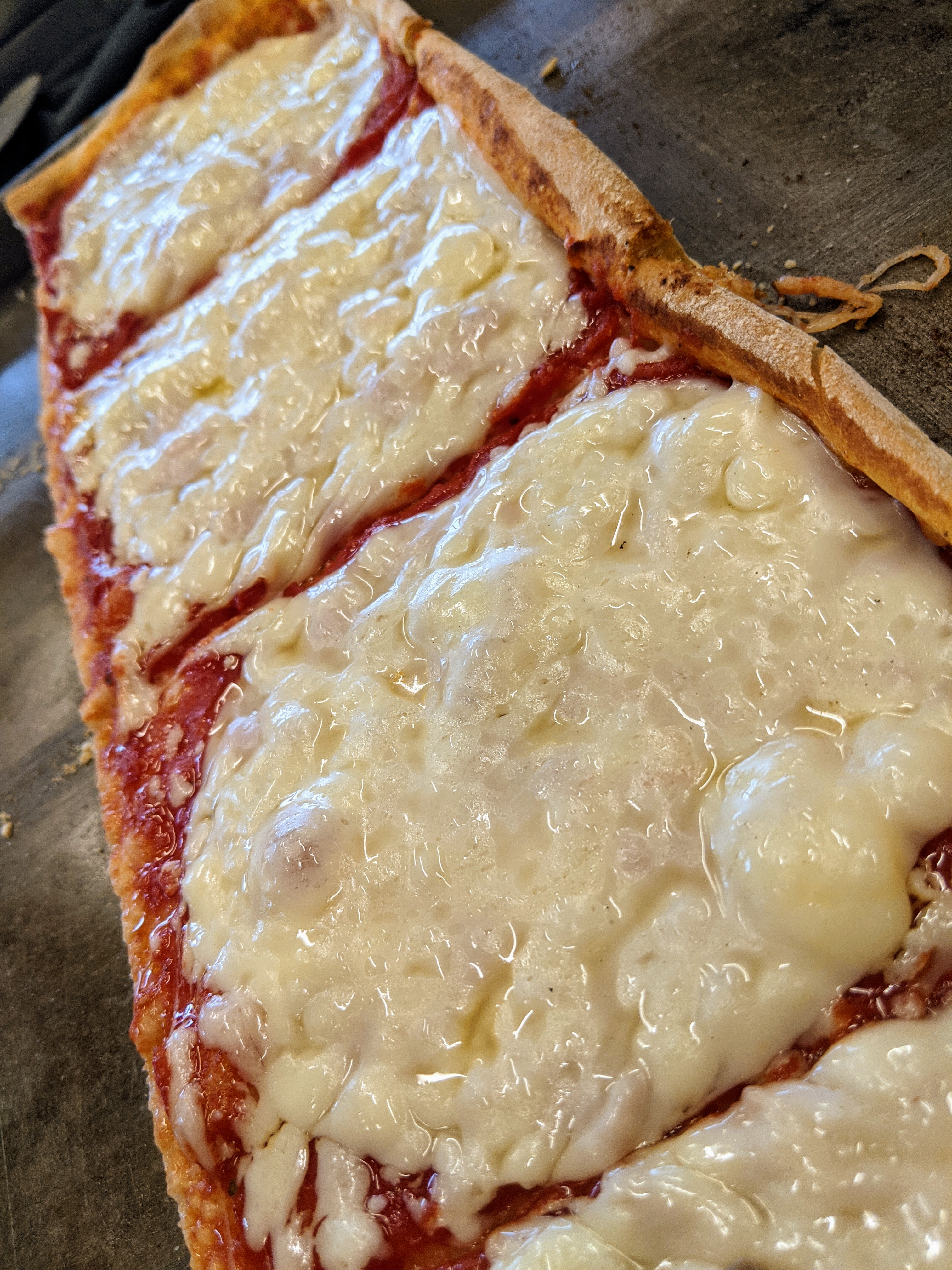 Order Extra Provolone Cheese Pizza Slice food online from Tripoli Pizza & Bakery store, Methuen on bringmethat.com