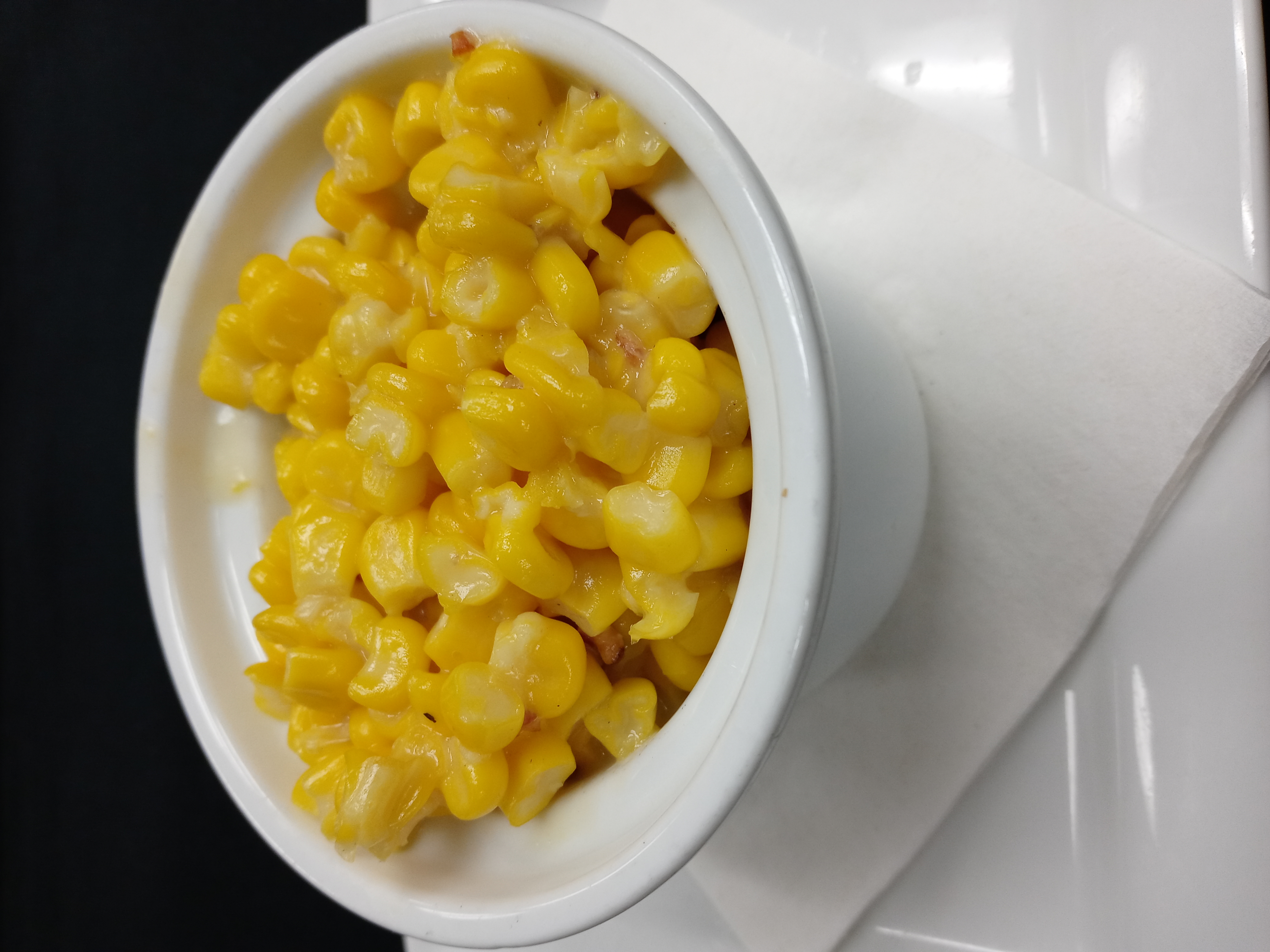 Order Creamed Corn contains Bacon food online from Black Rock Bar & Grill store, Toledo on bringmethat.com