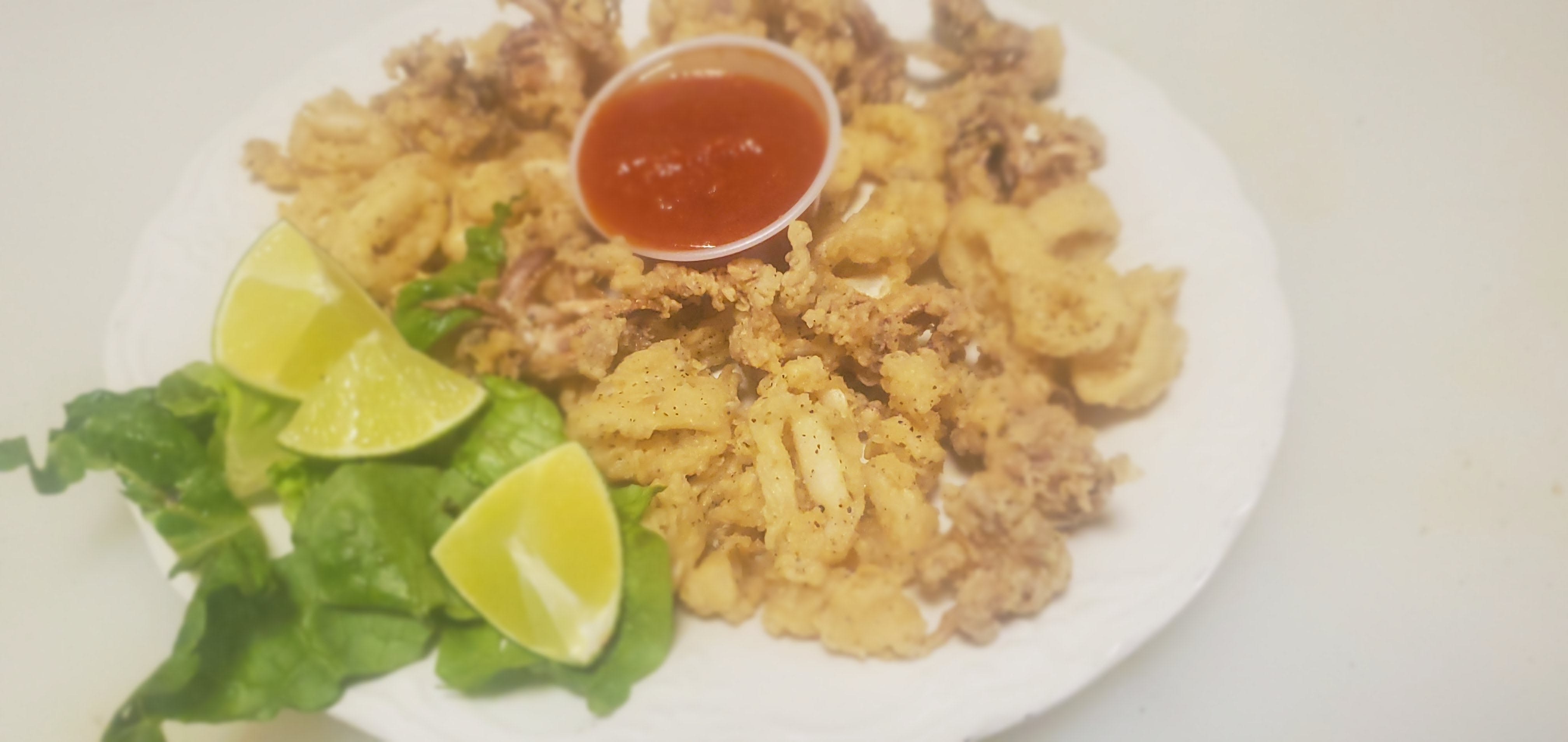 Order Fried Calamari - Appetizer food online from Mex & Taly Pizza store, Bridgeport on bringmethat.com