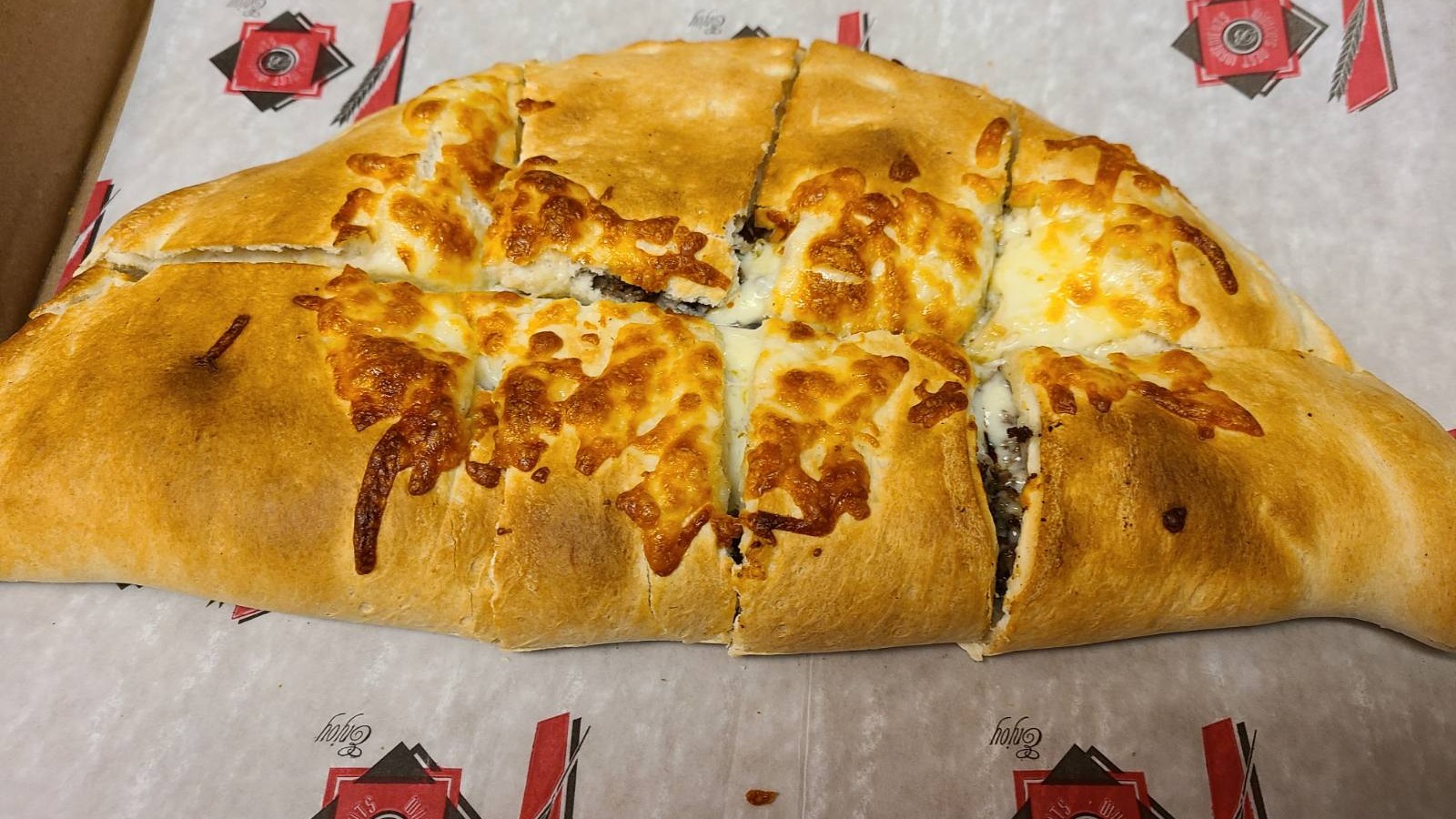 Order Steak and Cheese Calzone food online from Sun Pizza store, Boston on bringmethat.com