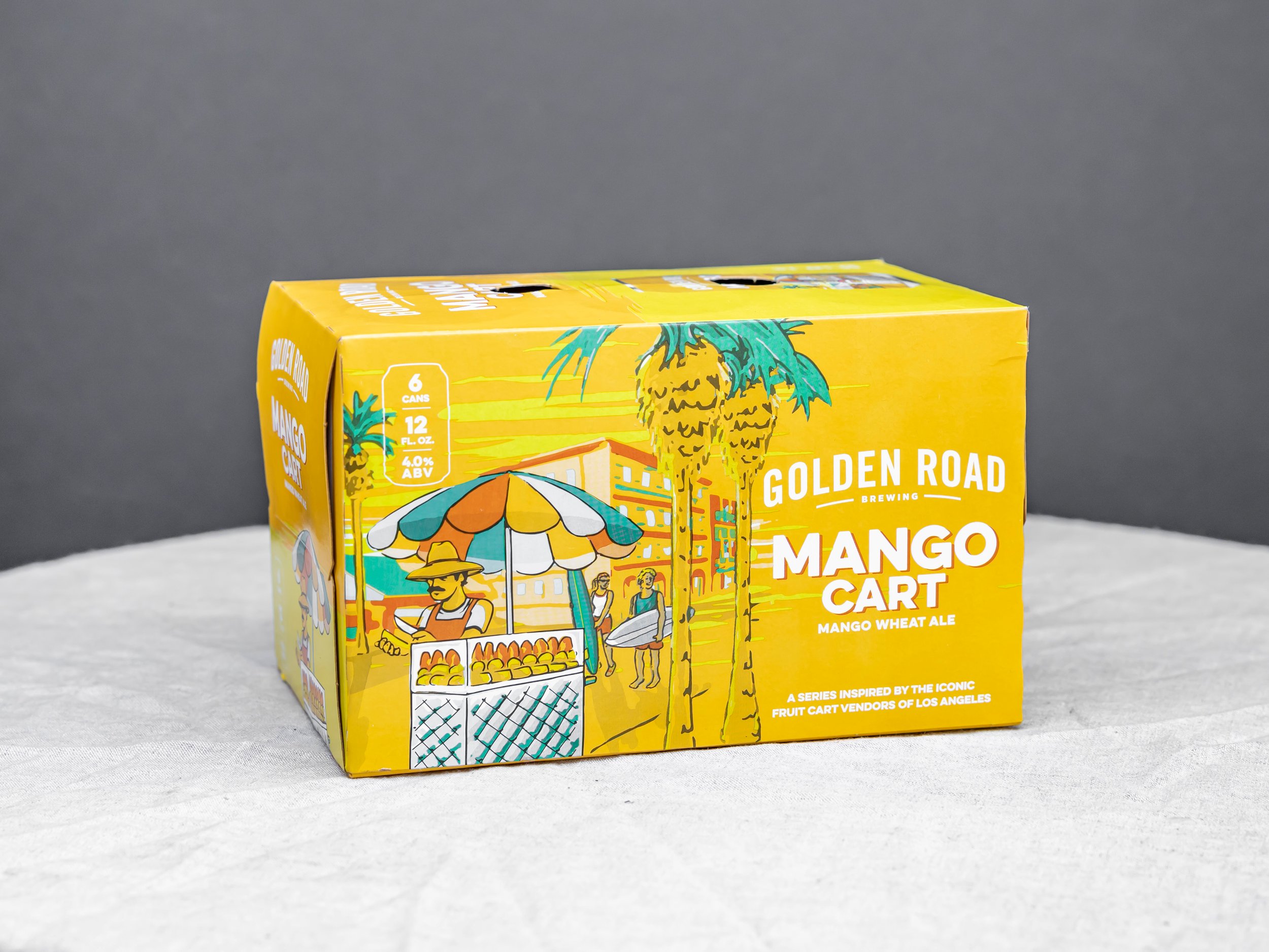 Order  Golden Road Mango Cart 6 pk 12 oz Cans food online from Bistro Liquor store, Huntington Beach on bringmethat.com