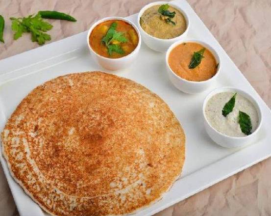 Order Plain Uthappam food online from Baisakhi Dhaba store, Topeka on bringmethat.com