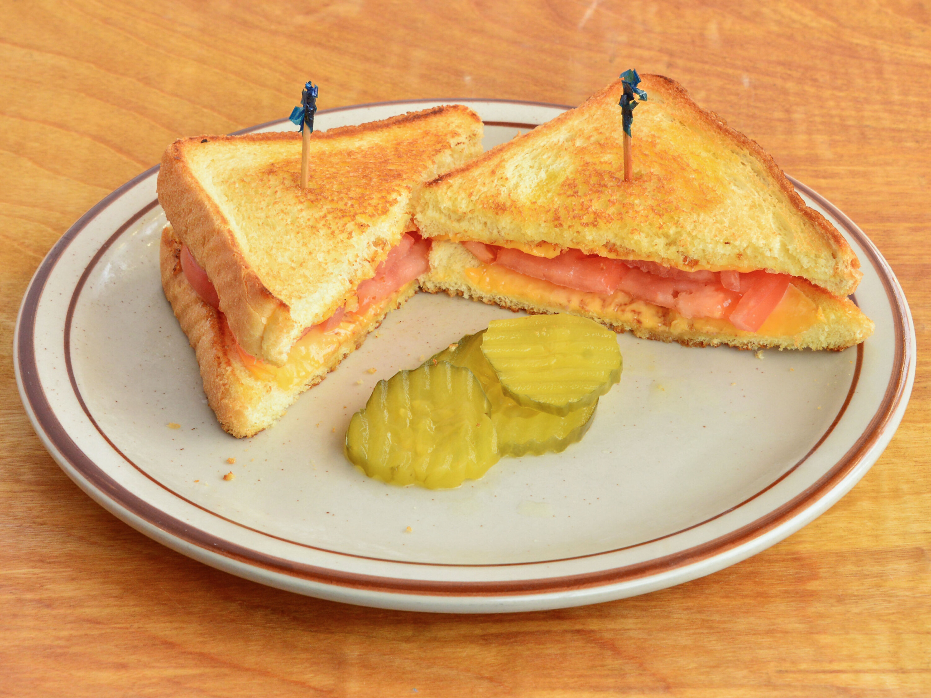 Order Grilled Tomato and Cheese food online from Sidewalk Cafe store, Painesville on bringmethat.com