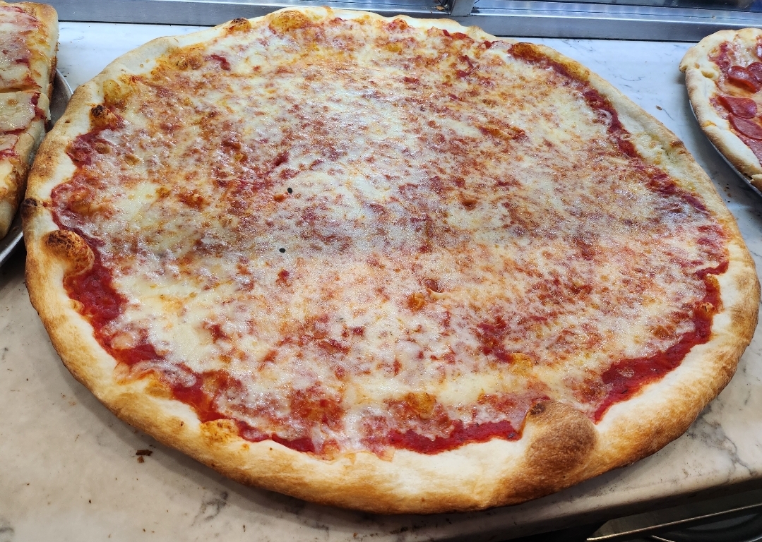 Order Cheese Pizza food online from Famous famiglia pizza store, New York on bringmethat.com
