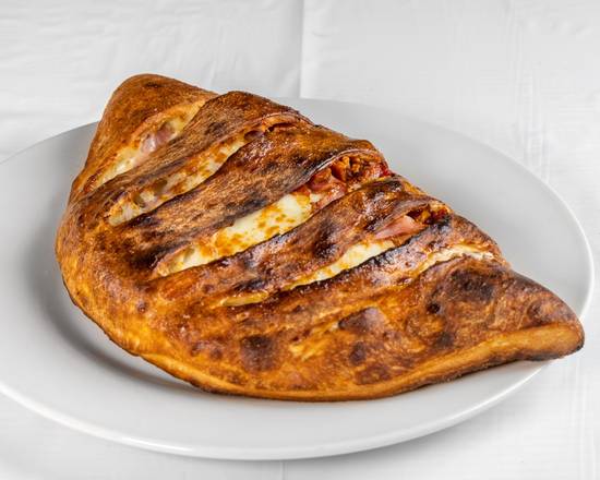 Order Meat Lover Calzone food online from Amante Pizza & Pasta store, Kirkland on bringmethat.com