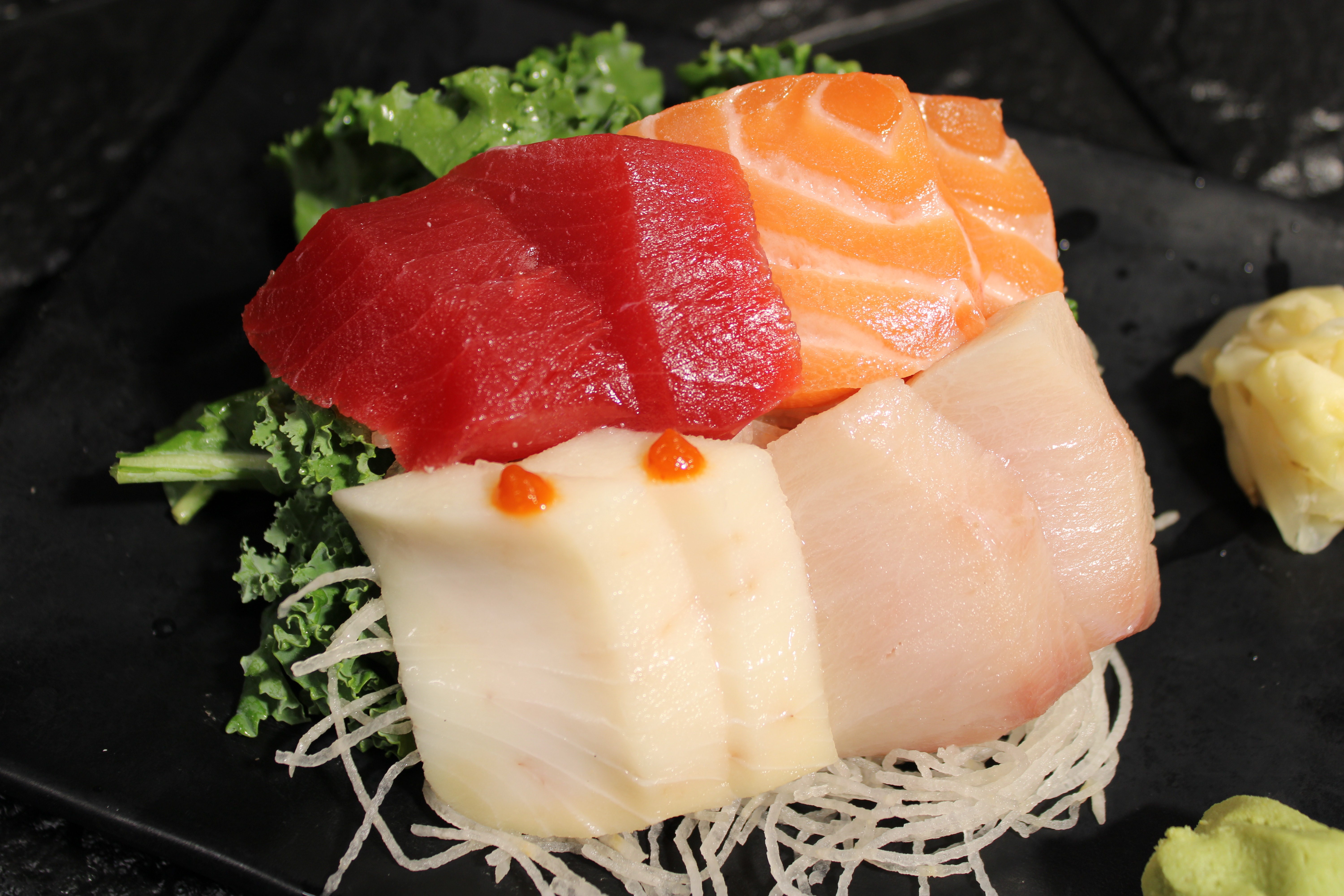 Order Sashimi Sampler food online from Kibo Sushi store, Ventura on bringmethat.com