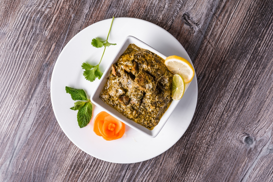 Order Lamb Saag (GF) food online from Lime & Lemon Indian Grill store, Raleigh on bringmethat.com