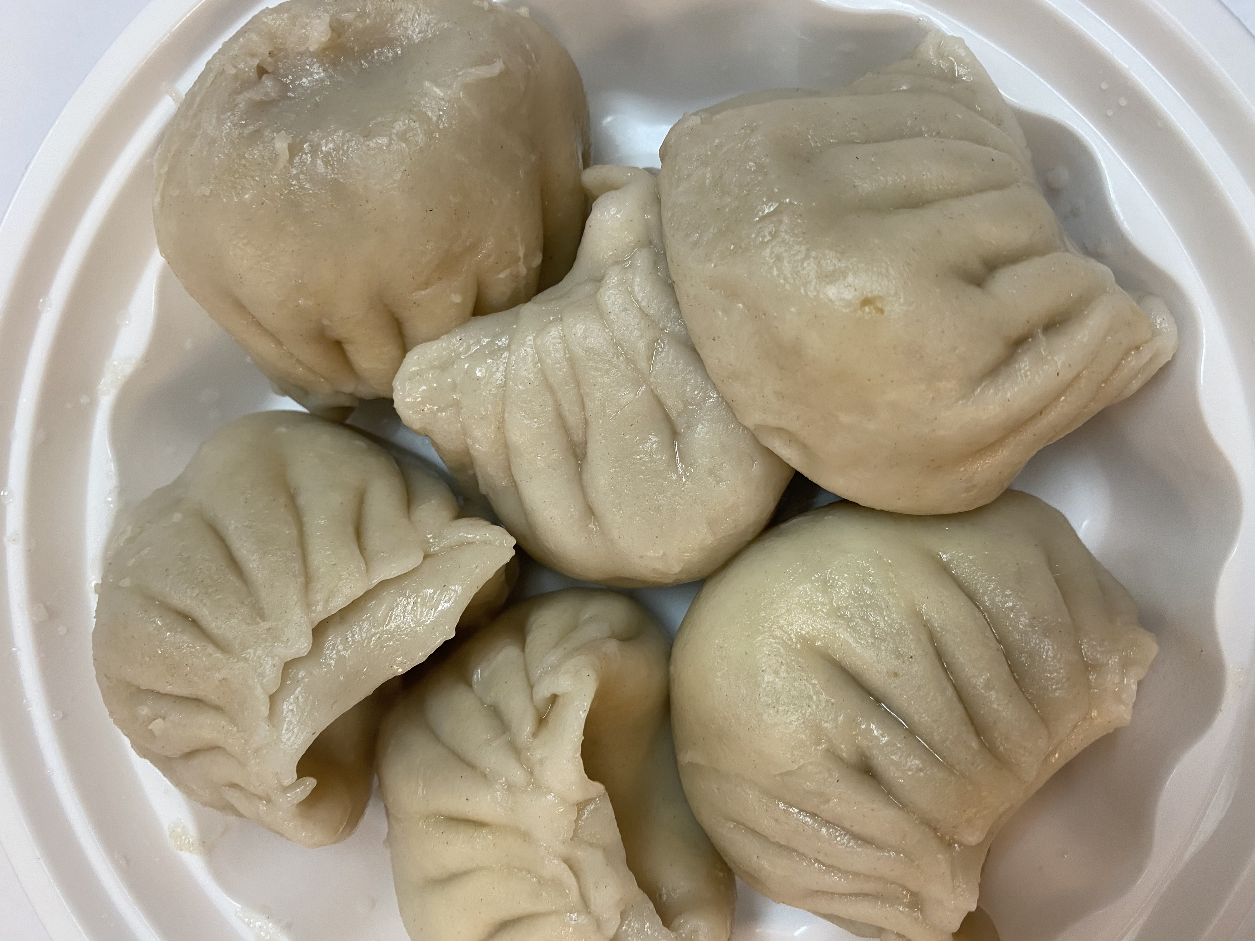 Order Steamed Pork Dumplings food online from New Hunan Wok store, Brooklyn on bringmethat.com