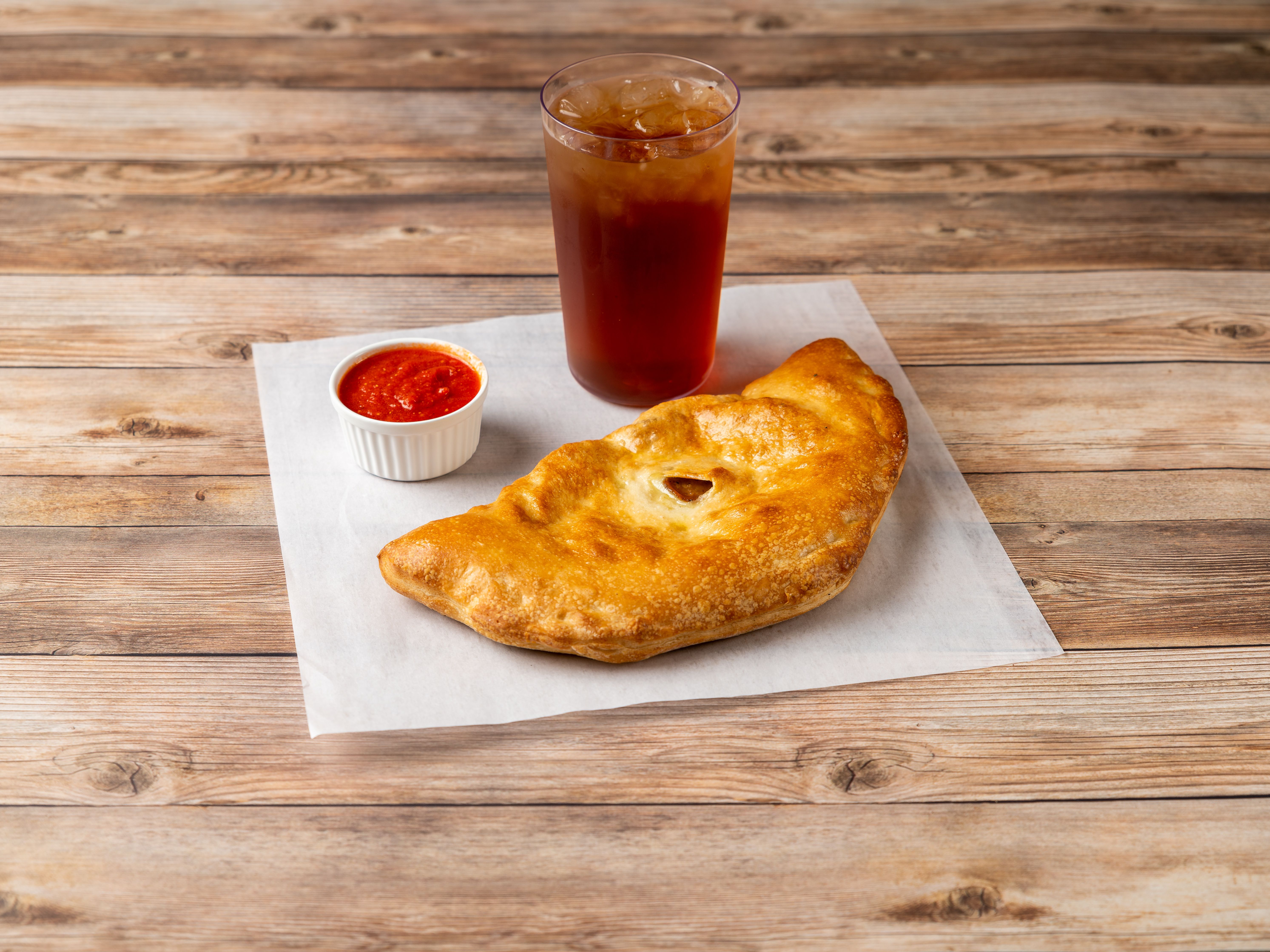 Order 1-Topping Small Calzone and 20 oz. Drink Special food online from Highlander Pizza store, Radford on bringmethat.com