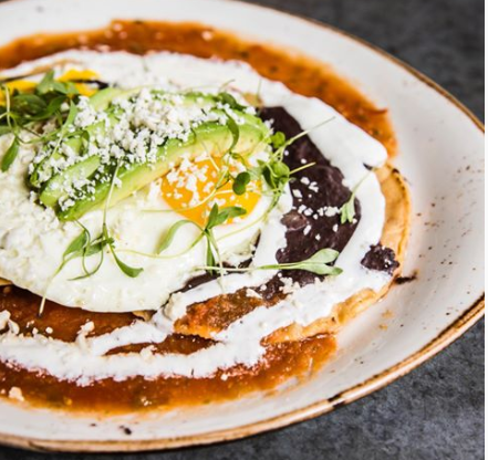 Order Huevos Rancheros Plate food online from State Fare Kitchen & Bar store, Houston on bringmethat.com