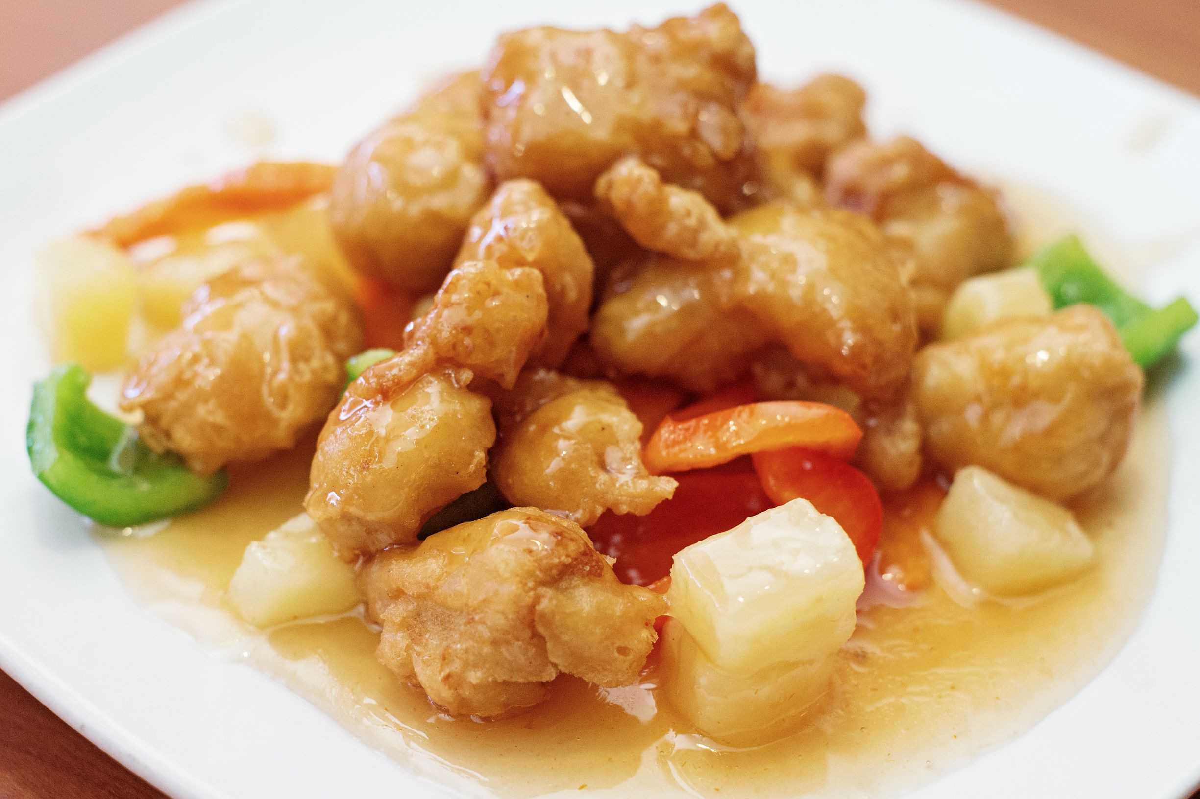 Order Sweet and Sour Chicken food online from Red Ginger China Bistro store, Saint Paul on bringmethat.com