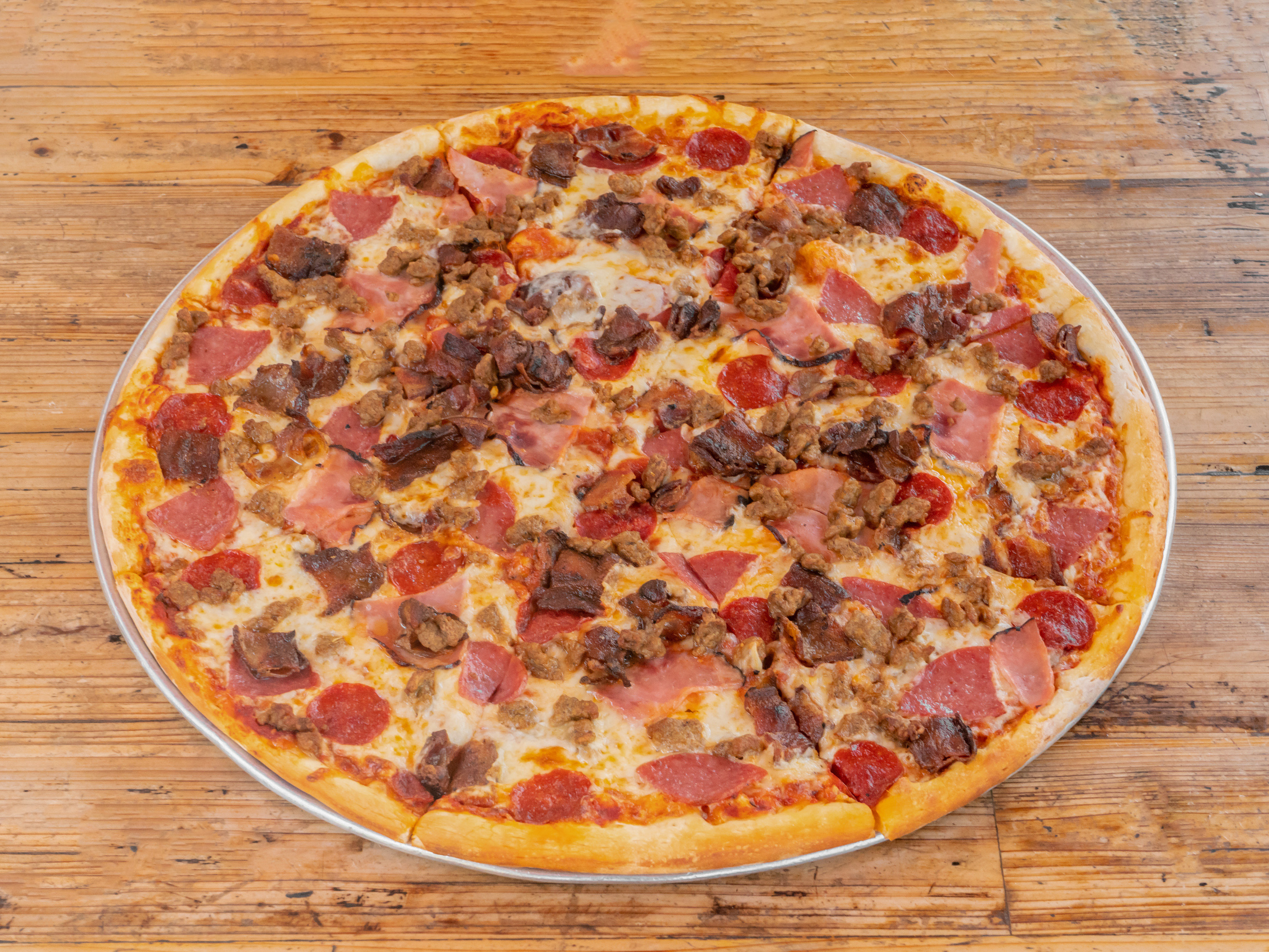 Order Meat Lovers Classic Slice food online from Sf Hole In The Wall Pizza store, San Francisco on bringmethat.com