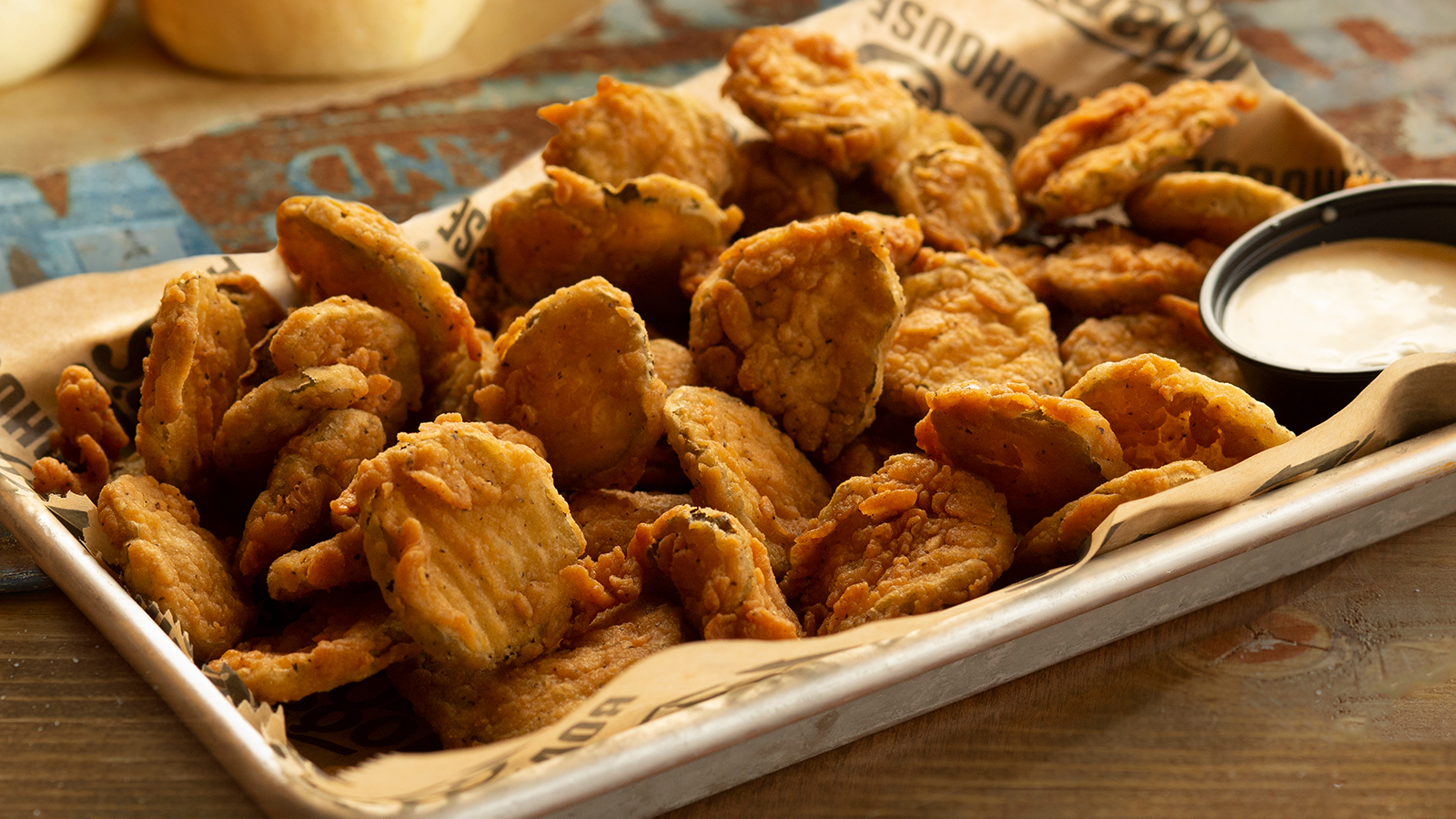Order Fried Pickles food online from Logan's Roadhouse store, Fontana on bringmethat.com