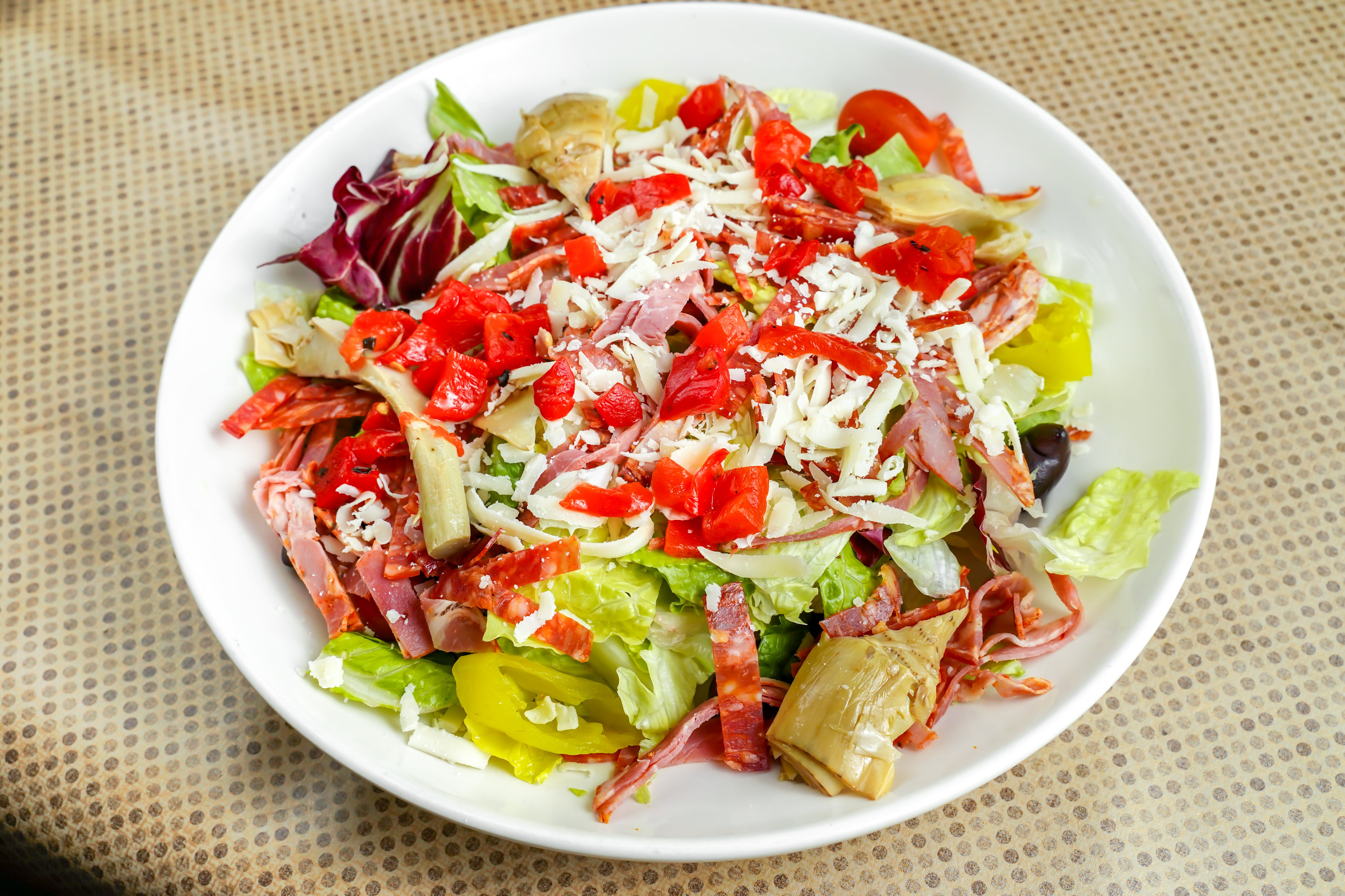 Order Antipasto Salad - Entree food online from Connie's Pizza store, Chicago on bringmethat.com