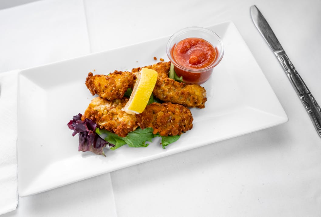 Order Fried Oysters - 4 Pieces food online from Alessios Seafood Grille store, Warrington on bringmethat.com