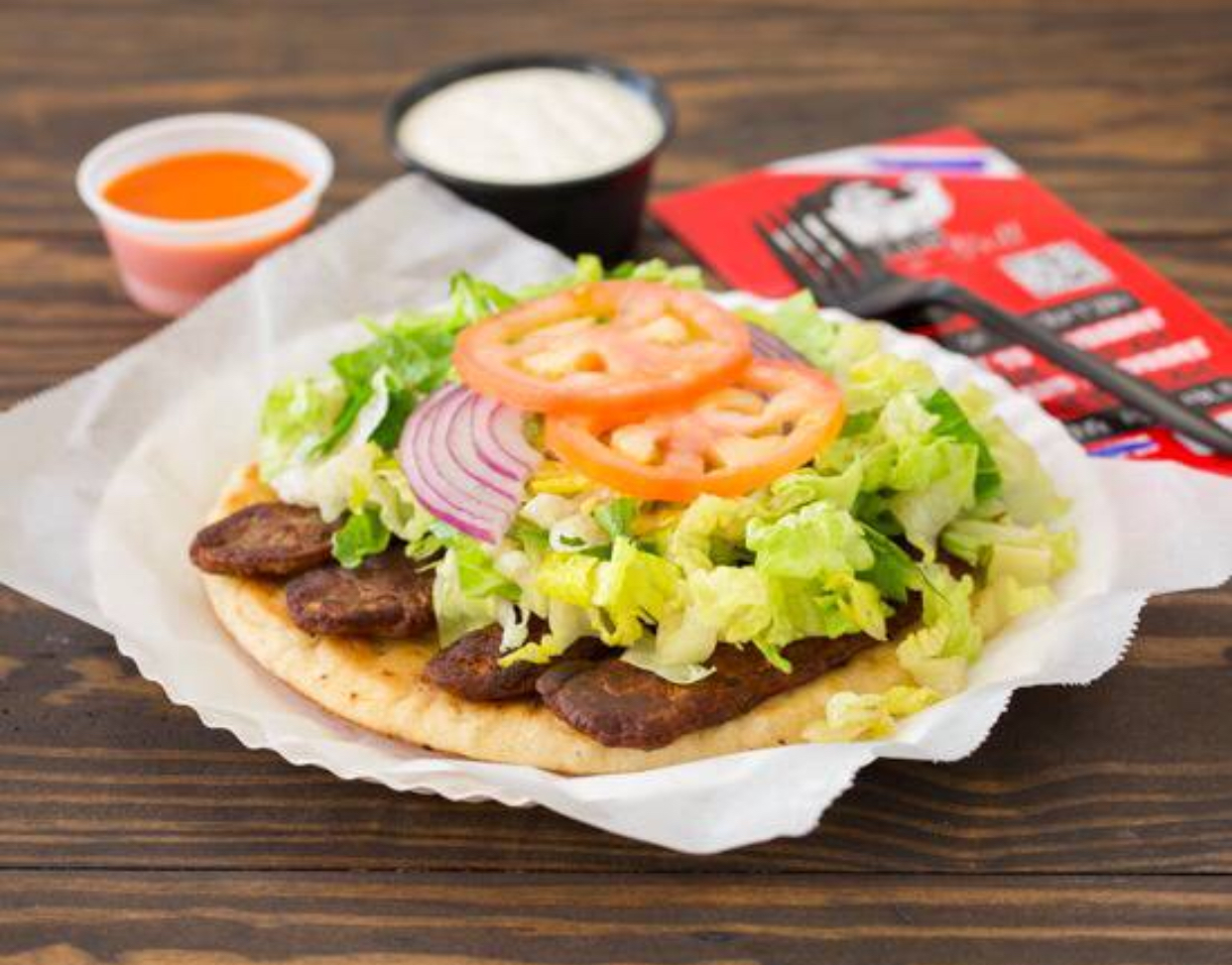 Order Traditional Gyro Sandwich  food online from Texas Wings & Grill store, Austin on bringmethat.com