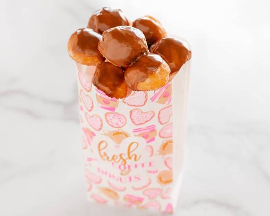 Order Chocolate Donut Holes by the Doz food online from Kim's Donuts store, Dallas on bringmethat.com