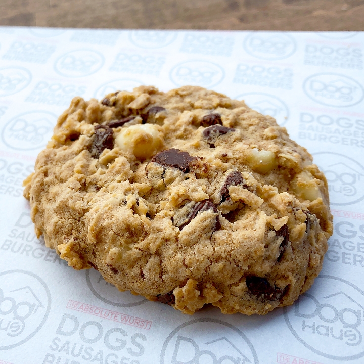Order Royale Cookie (macadamia nuts, fresh coconut and semisweet chocolate) food online from Dog Haus store, Canoga Park on bringmethat.com
