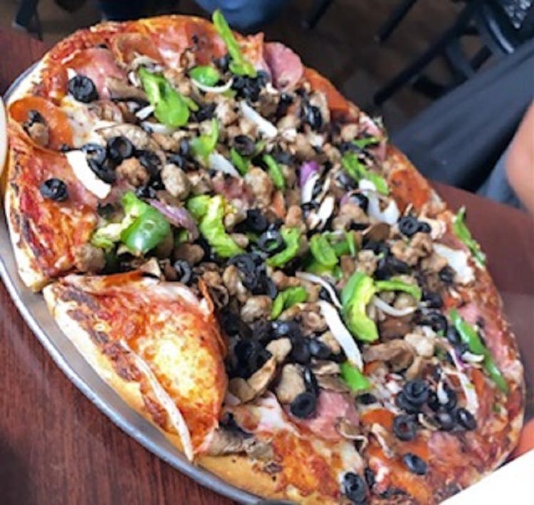 Order Gluten Free Combination Pizza - Small 10'' (Serves 2 People) food online from Rico's Pizza store, Los Banos on bringmethat.com