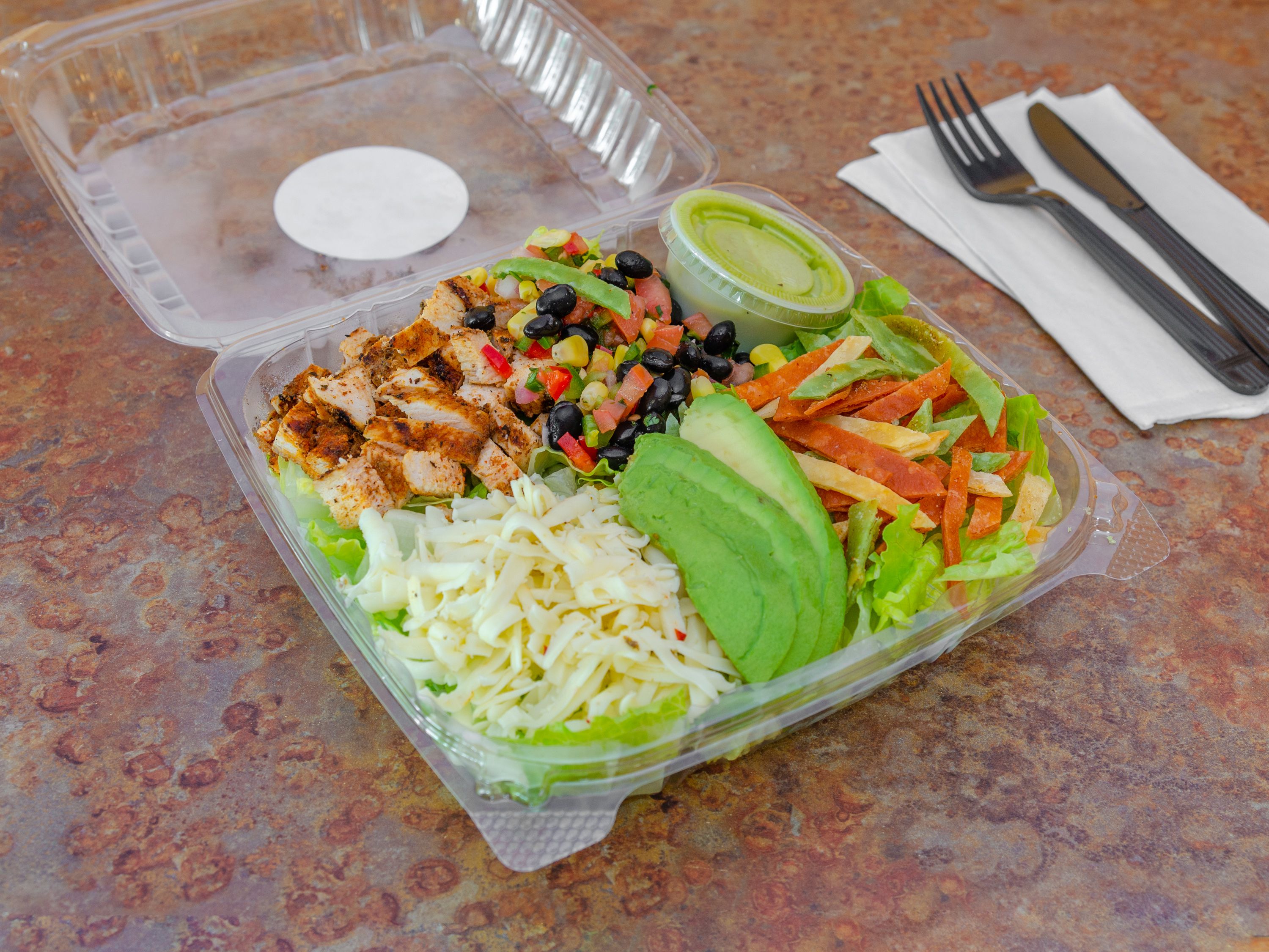 Order Penne Caesar Salad with Blackened Chicken food online from Suburban Eats store, Melville on bringmethat.com