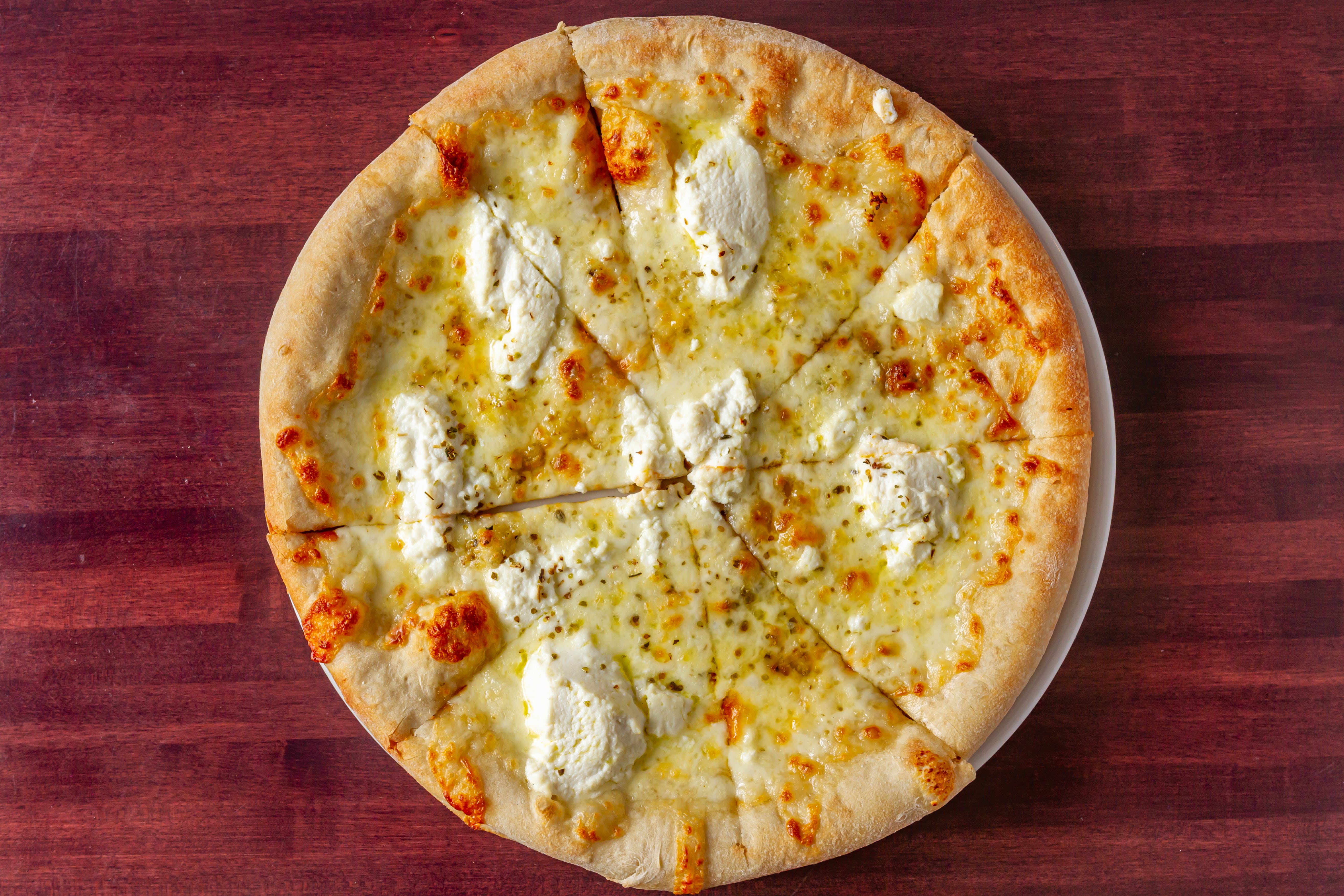 Order White Pizza - 12" food online from Bella Napoli store, Pasadena on bringmethat.com