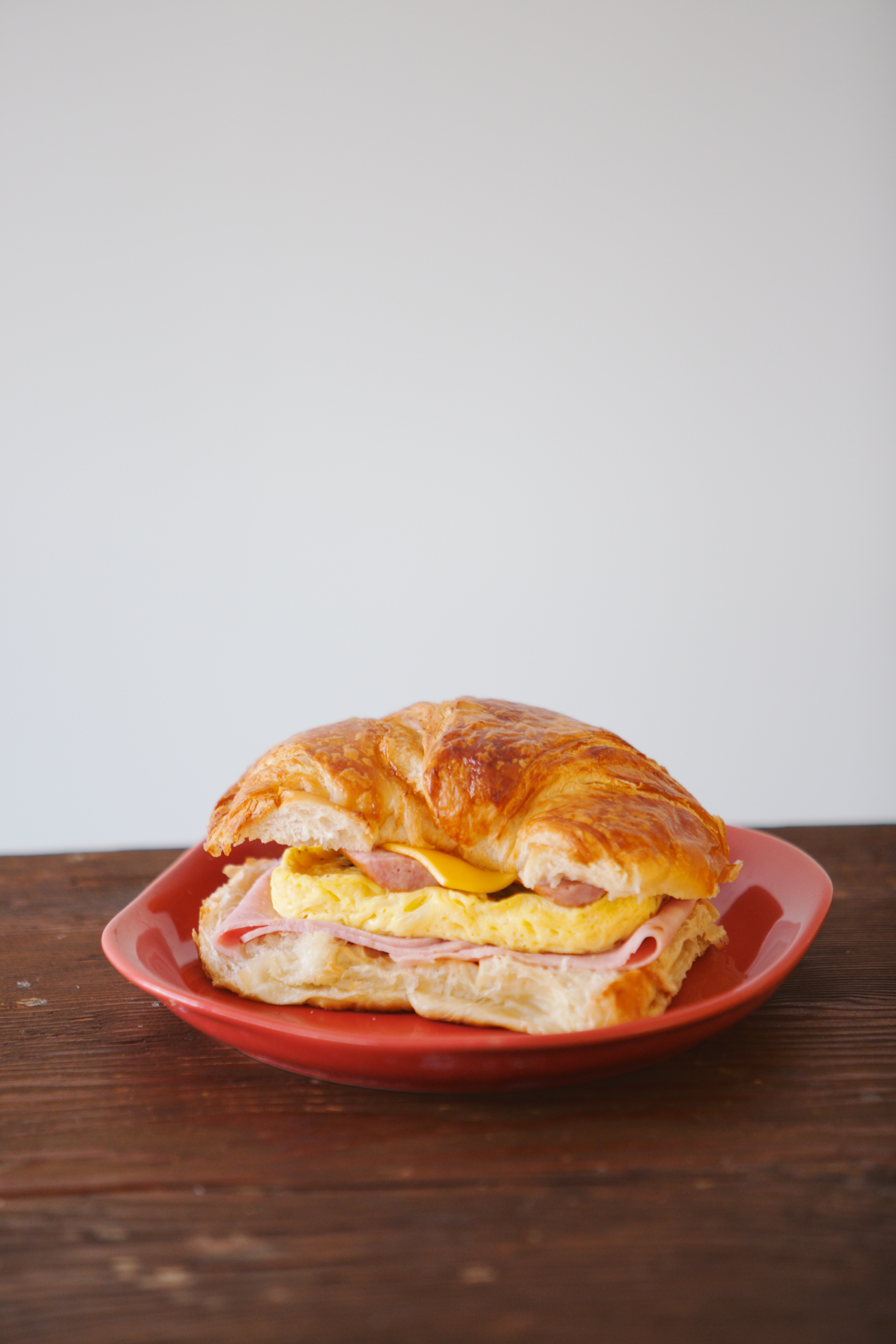 Order Egg Ham Sausage Cheese Croissant Sandwich food online from Smile Donut House store, Los Angeles on bringmethat.com
