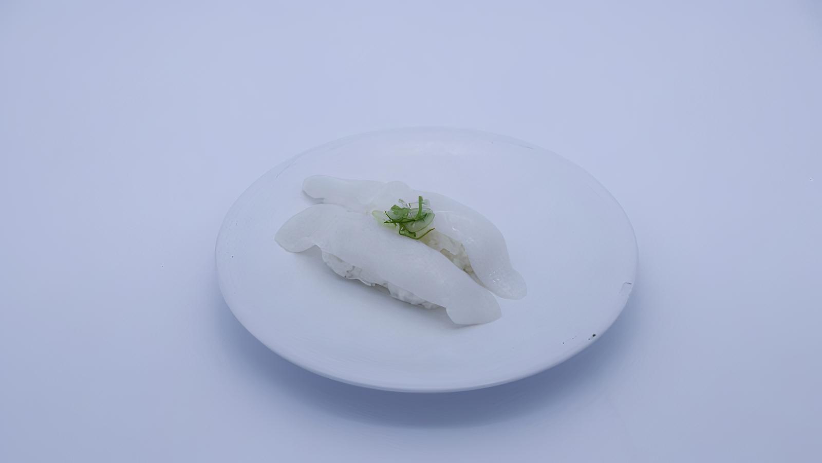 Order Squid (2 Pieces) food online from Sapporo Revolving Sushi store, Las Vegas on bringmethat.com