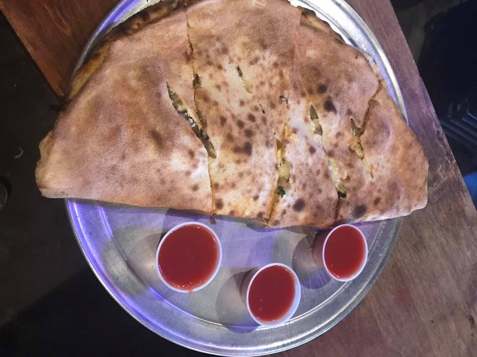 Order Halfshell Calzone - Calzone food online from Lou's Woodfire Pizza store, Del Rio on bringmethat.com