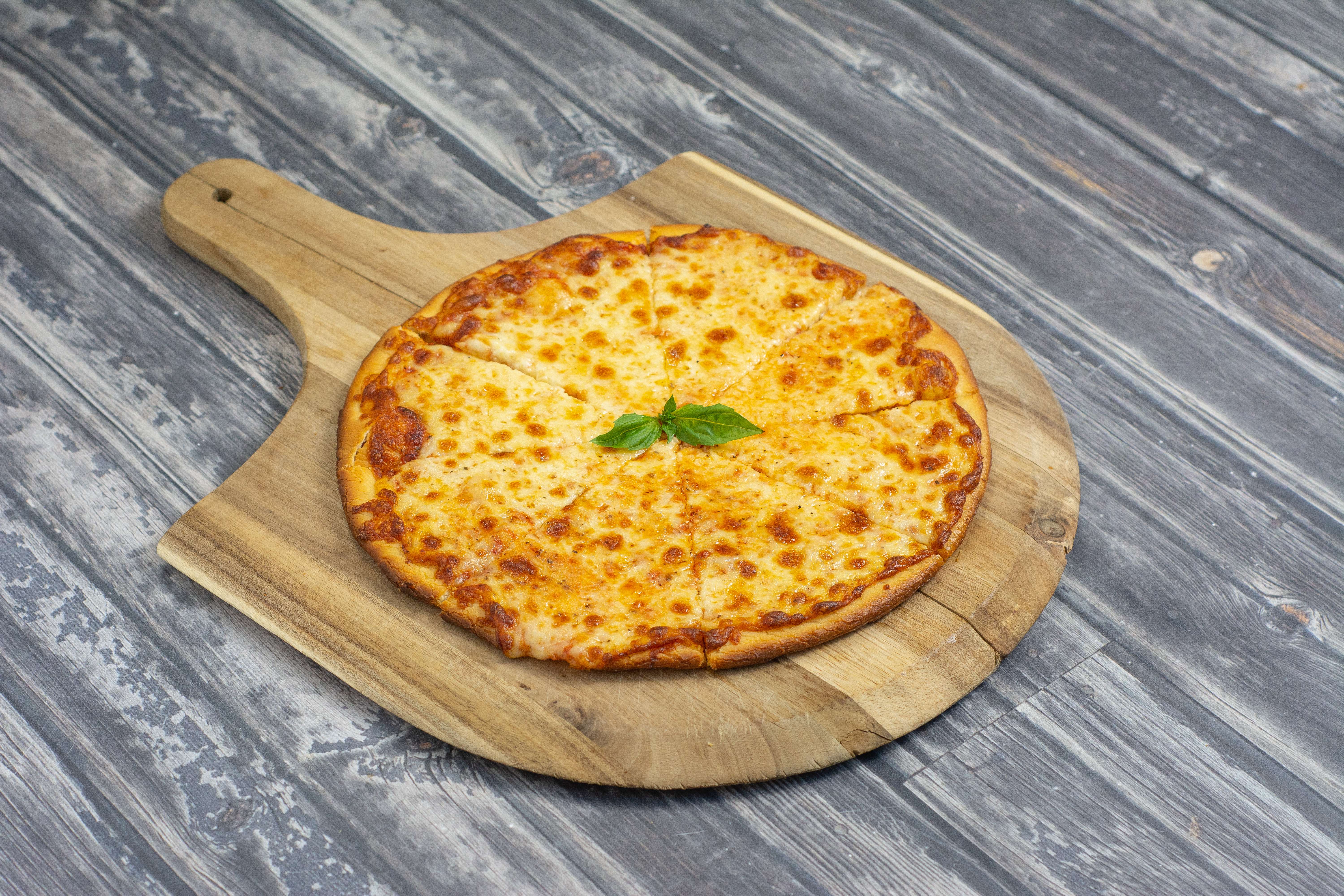 Order Basic Cheese Pizza food online from Legends Pizza store, Cupertino on bringmethat.com