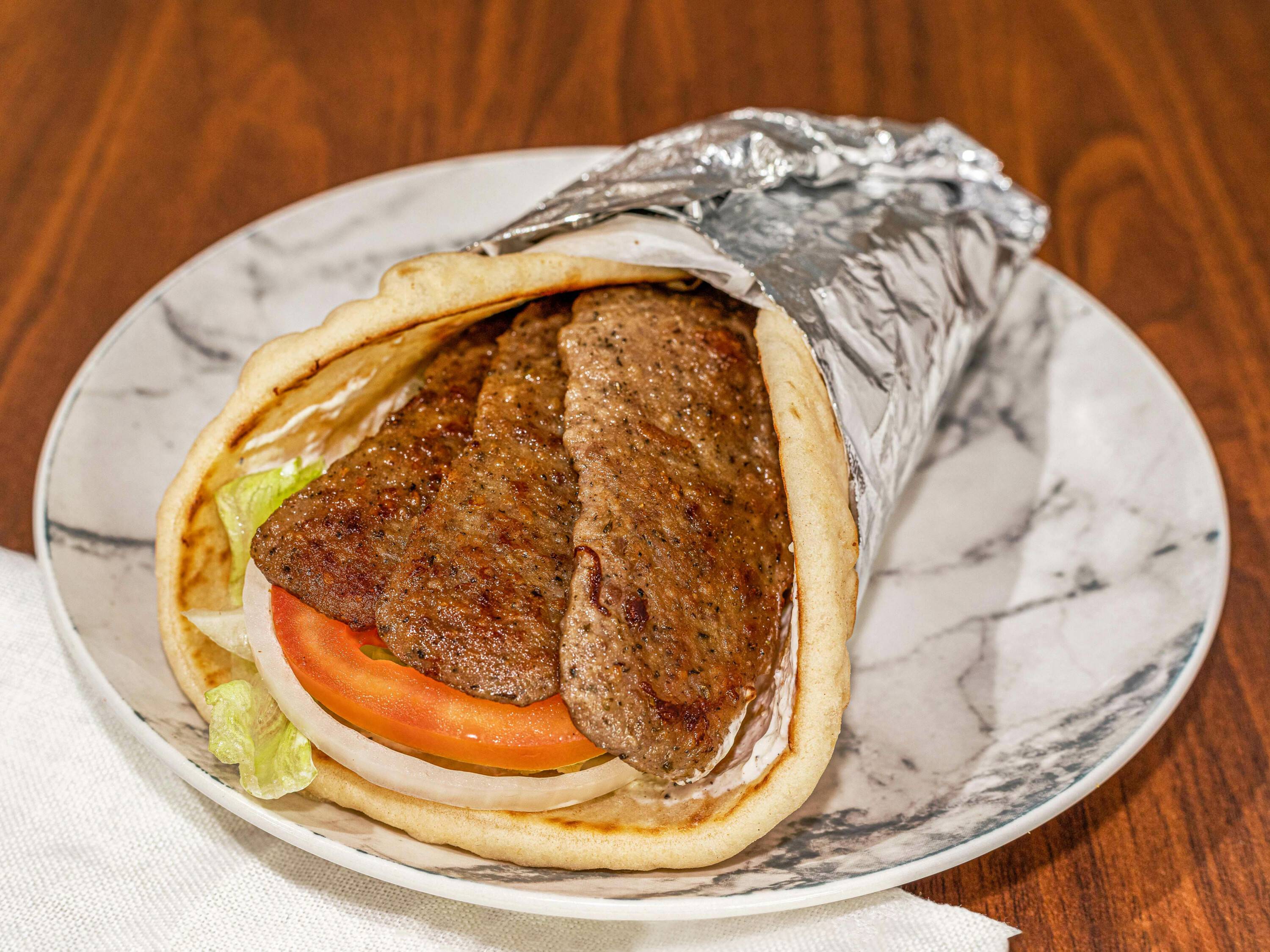 Order Gyro Wrap Only food online from A1 Wings store, Lilburn on bringmethat.com