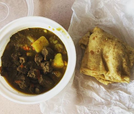 Order Curry Duck with Roti food online from Limins Cafe Caribe store, East Orange on bringmethat.com