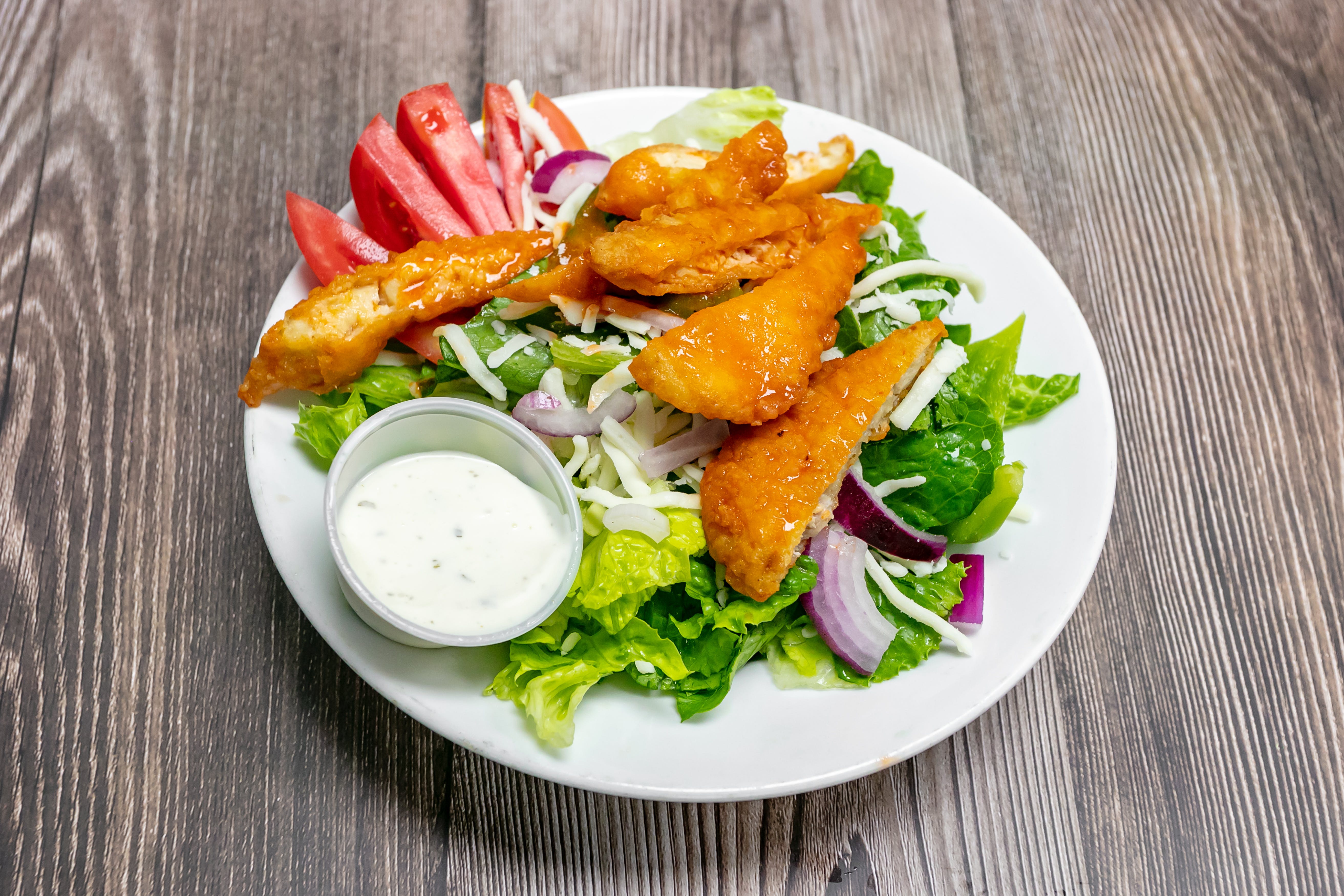 Order Spicy Buffalo Chicken Salad - Small food online from Star Pizza store, Roswell on bringmethat.com