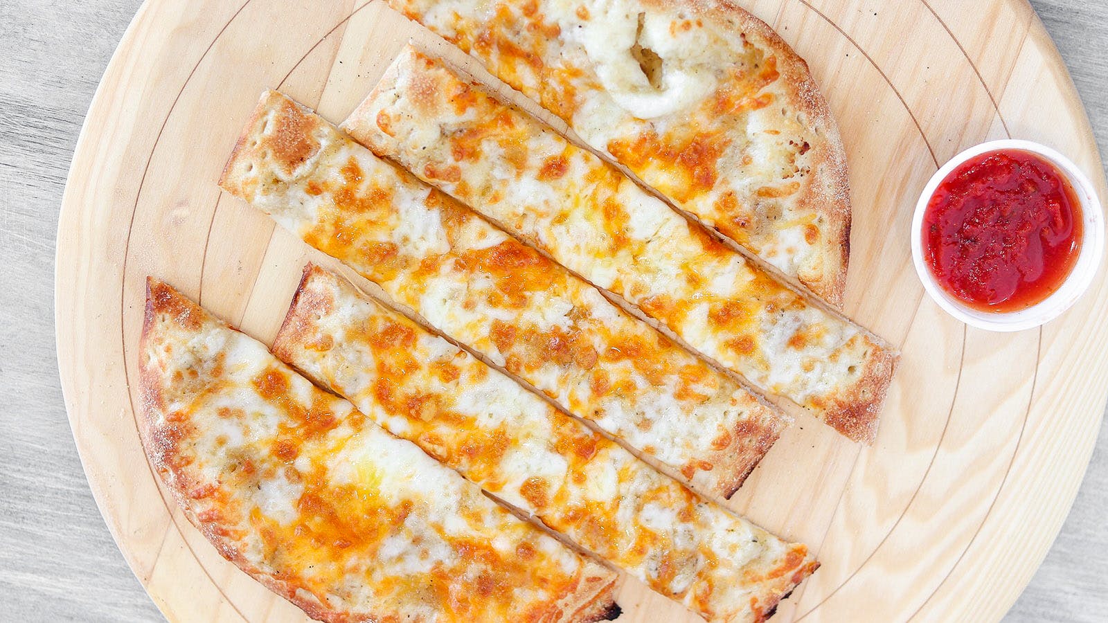 Order Cheesy Breadsticks - Halfzie food online from Firenza Pizza store, Los Angeles on bringmethat.com