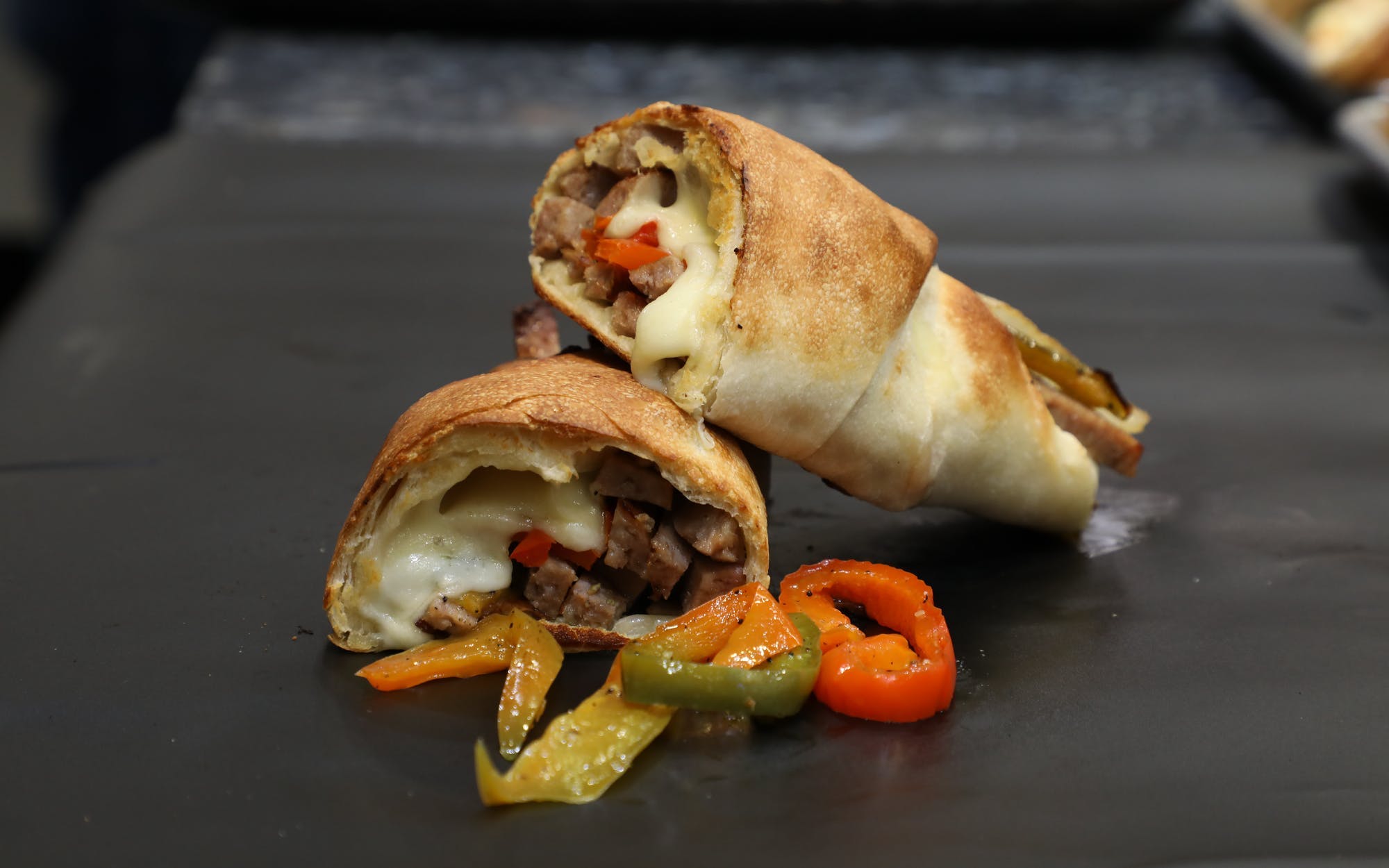 Order Sausage & Peppers Roll - Roll food online from Little Italy Pizza store, New York on bringmethat.com