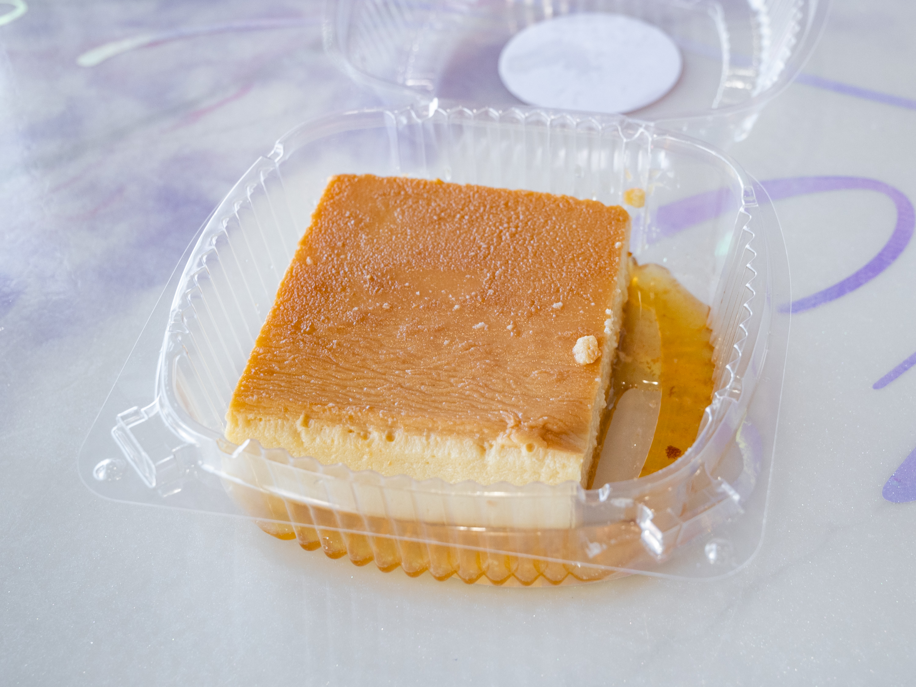 Order Flan Slice food online from Sweet Grace Heavenly Cakes store, Lawrence on bringmethat.com