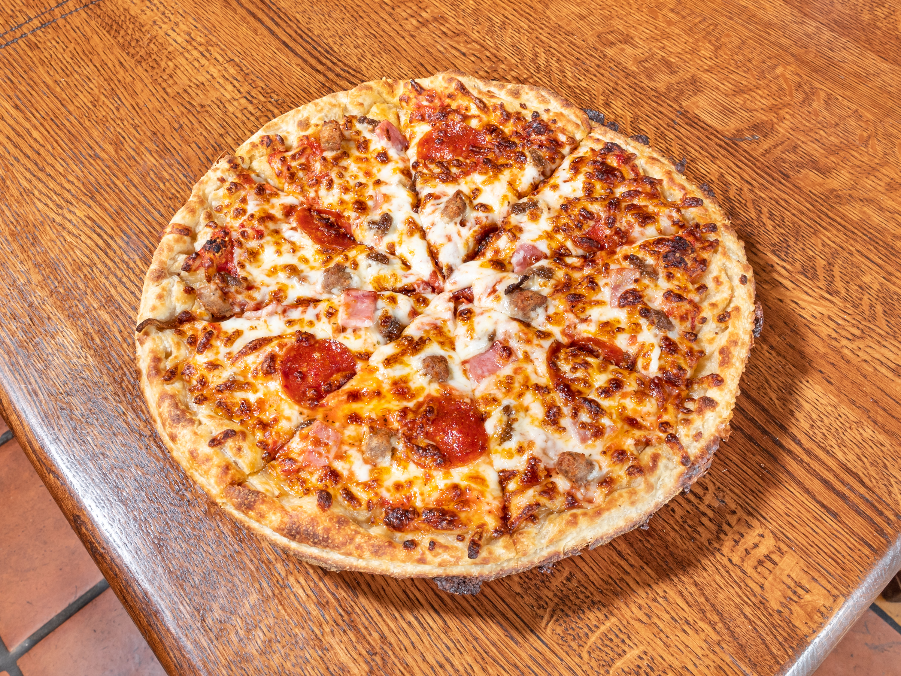 Order Meat Lovers Pizza food online from Mama Mia's Pizza store, Denver on bringmethat.com