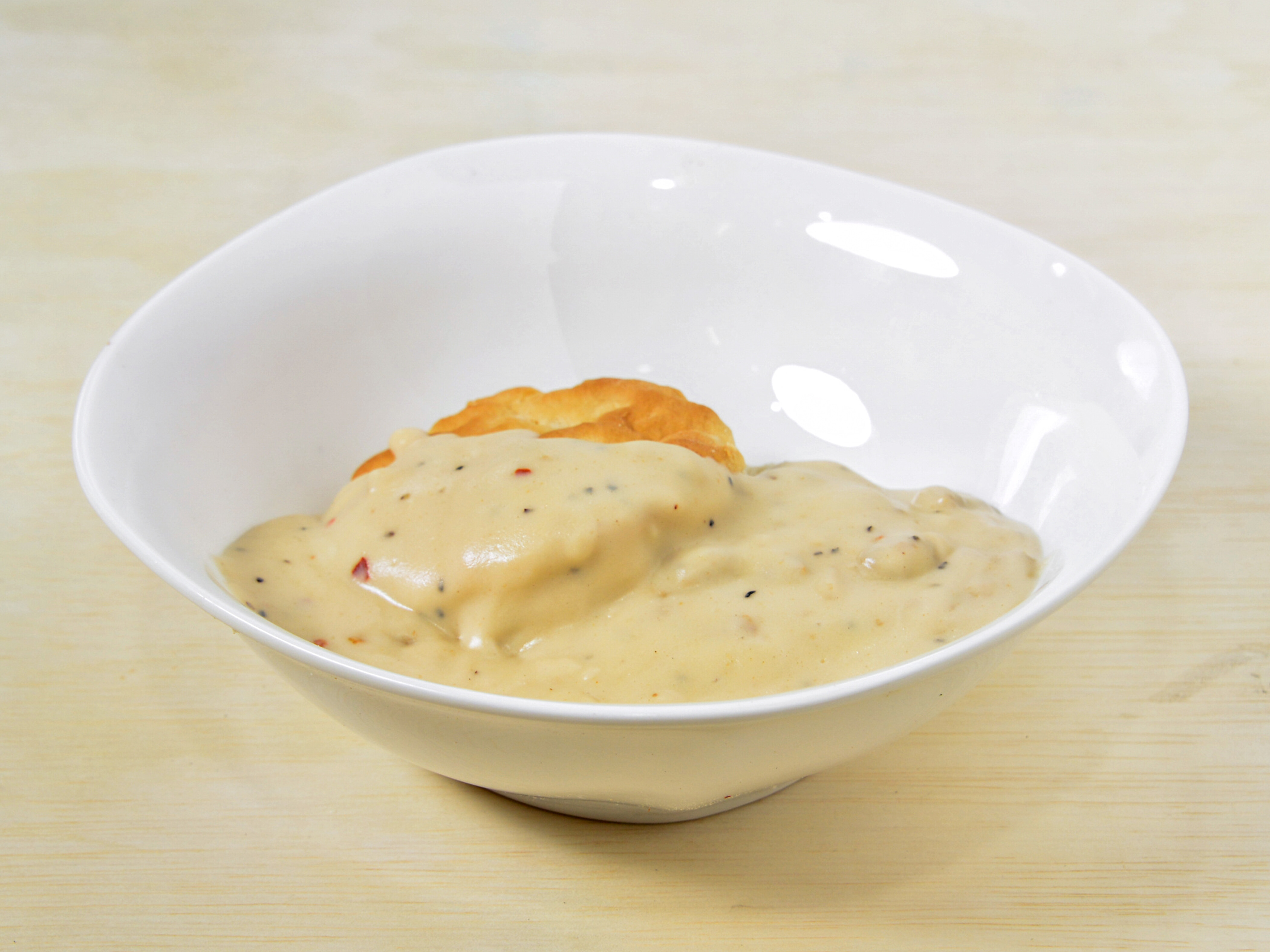 Order Biscuits and Gravy food online from Bake Place store, Cincinnati on bringmethat.com