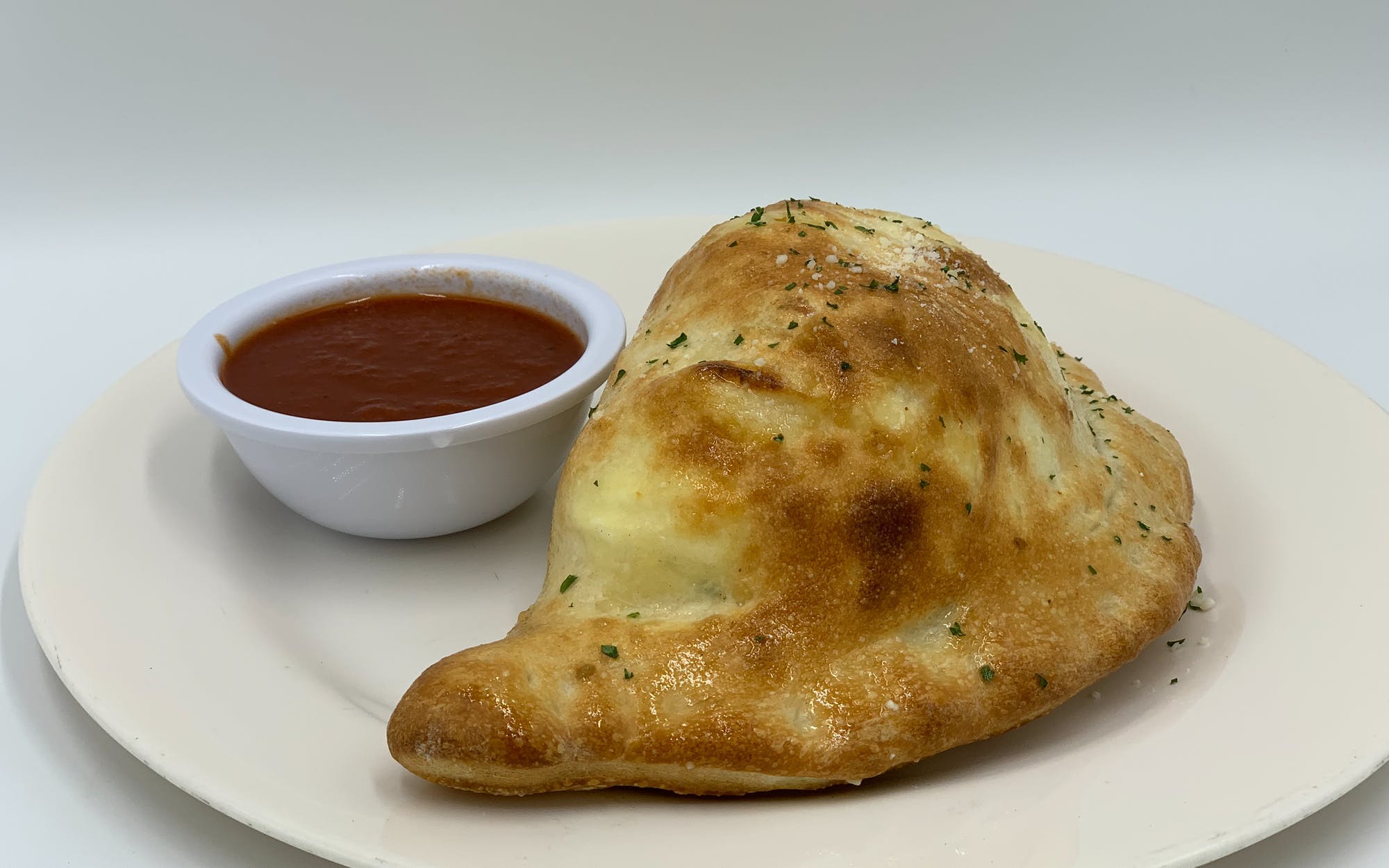 Order Cheese Calzone - Calzone food online from Mario Pizza store, Westbury on bringmethat.com