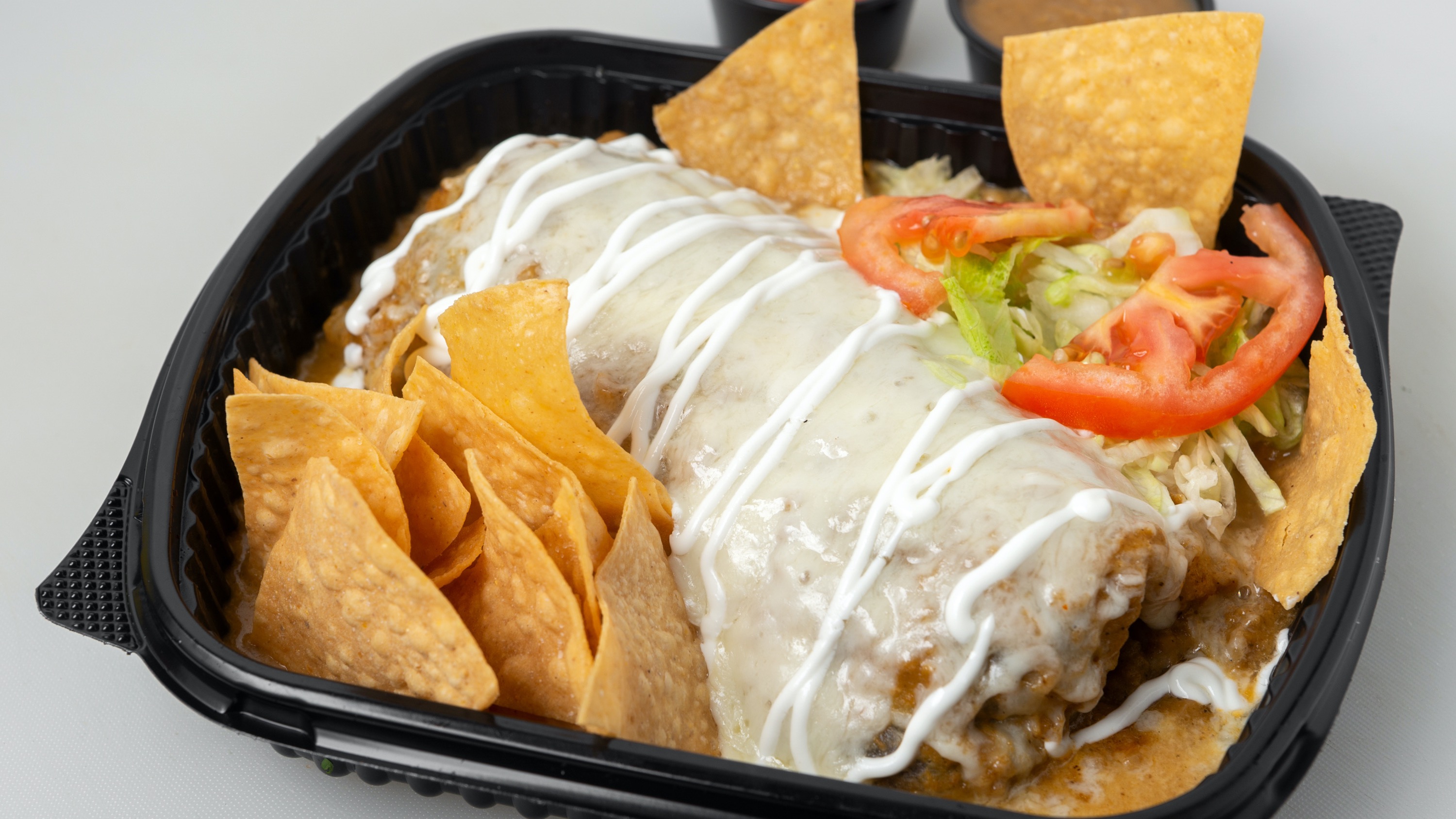 Order Wet Burrito food online from Tacos Panchito store, Corona on bringmethat.com